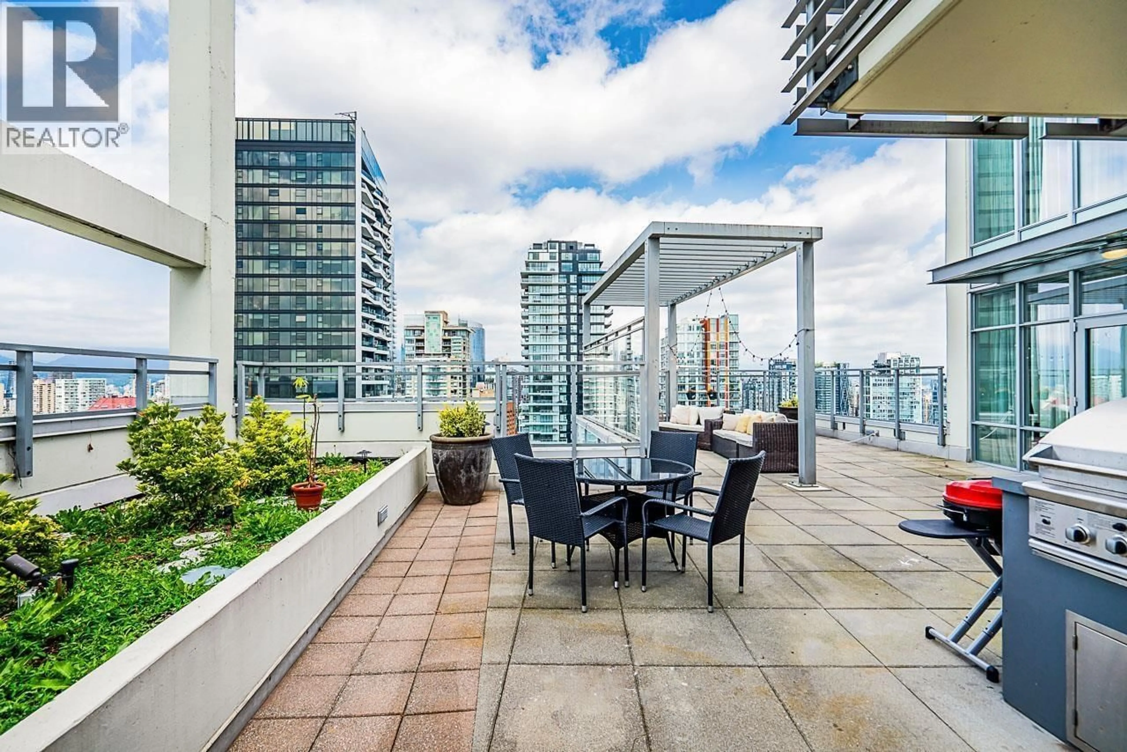 Patio, city buildings view from balcony for 2901 - 1455 HOWE STREET, Vancouver British Columbia V6Z1C2
