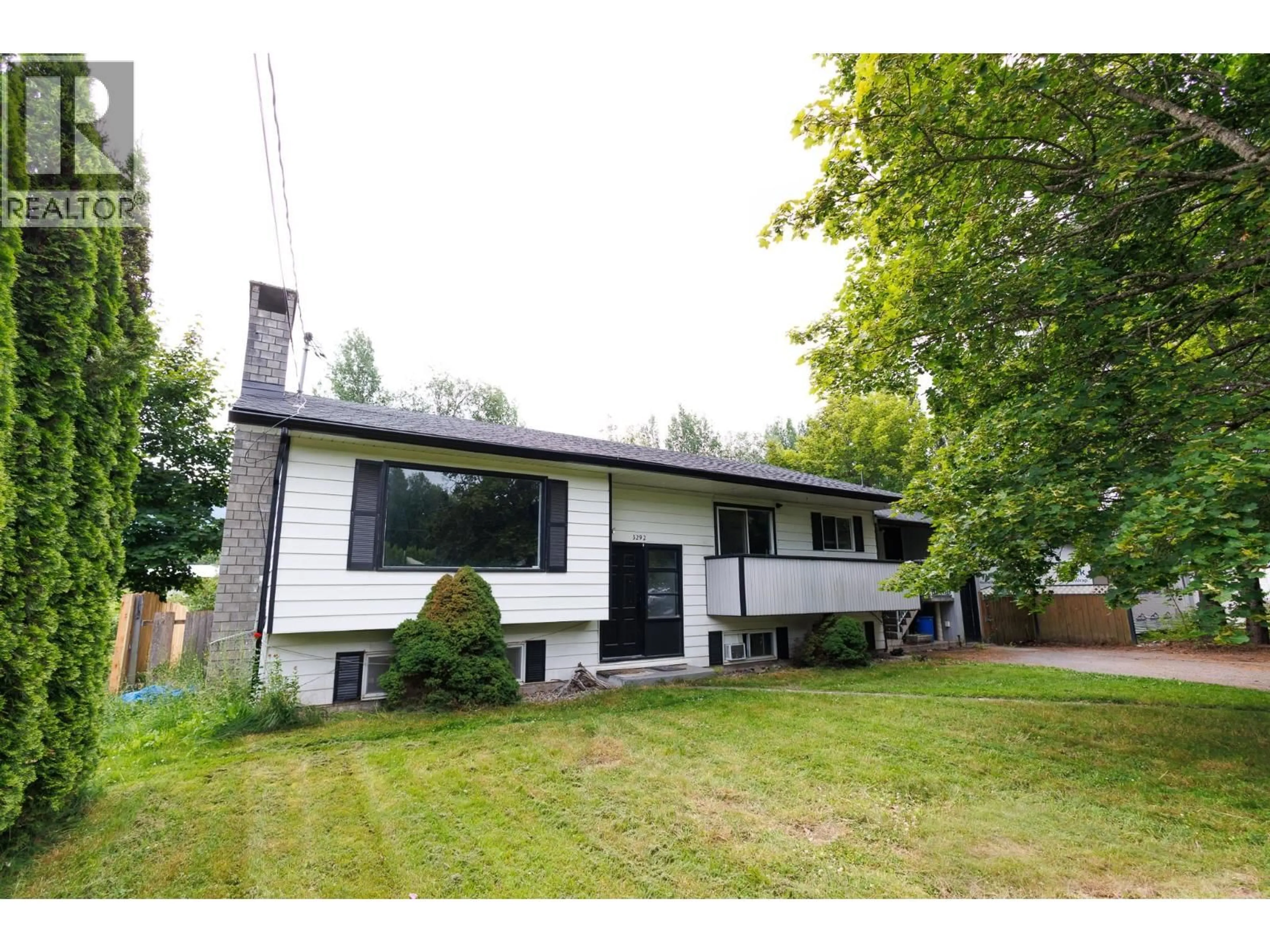 Home with vinyl exterior material, street for 3292 KOFOED DRIVE, Thornhill British Columbia V8G3P7