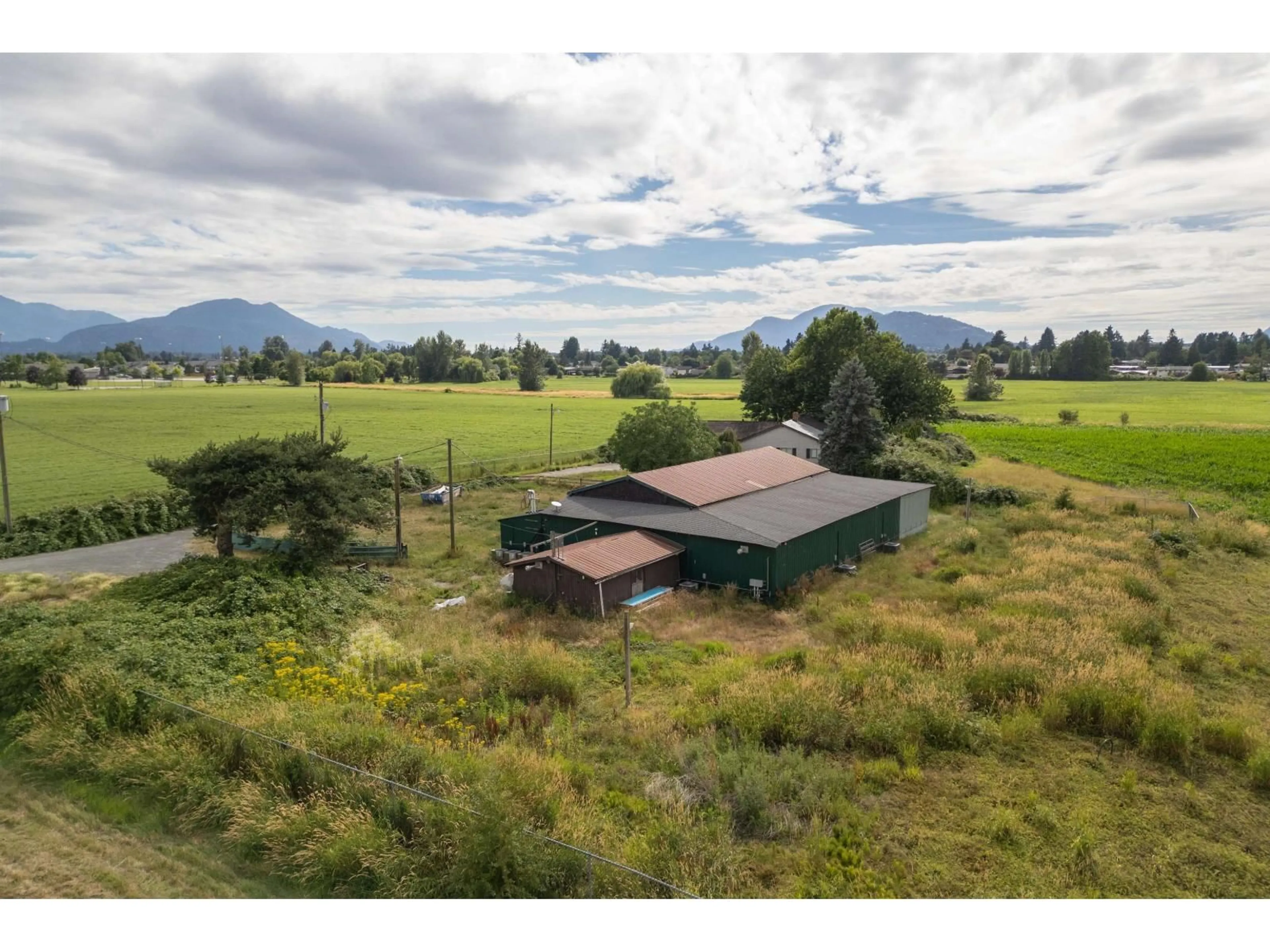 A pic from outside/outdoor area/front of a property/back of a property/a pic from drone, mountain view for 9575 PREST ROAD, Chilliwack British Columbia V2P8E3