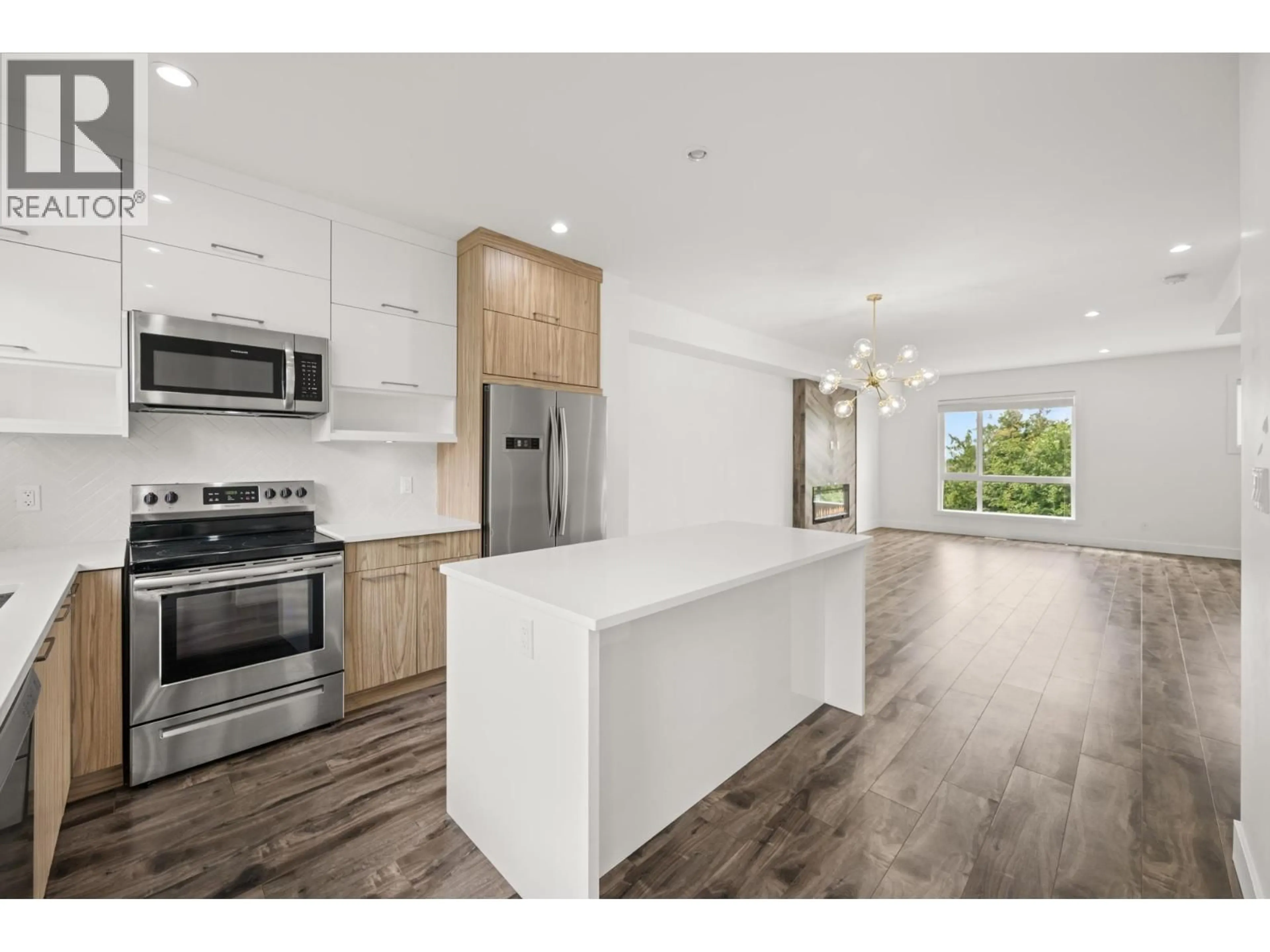 Open concept kitchen, unknown for 102 - 3423 ROXTON AVENUE, Coquitlam British Columbia V3B0G7