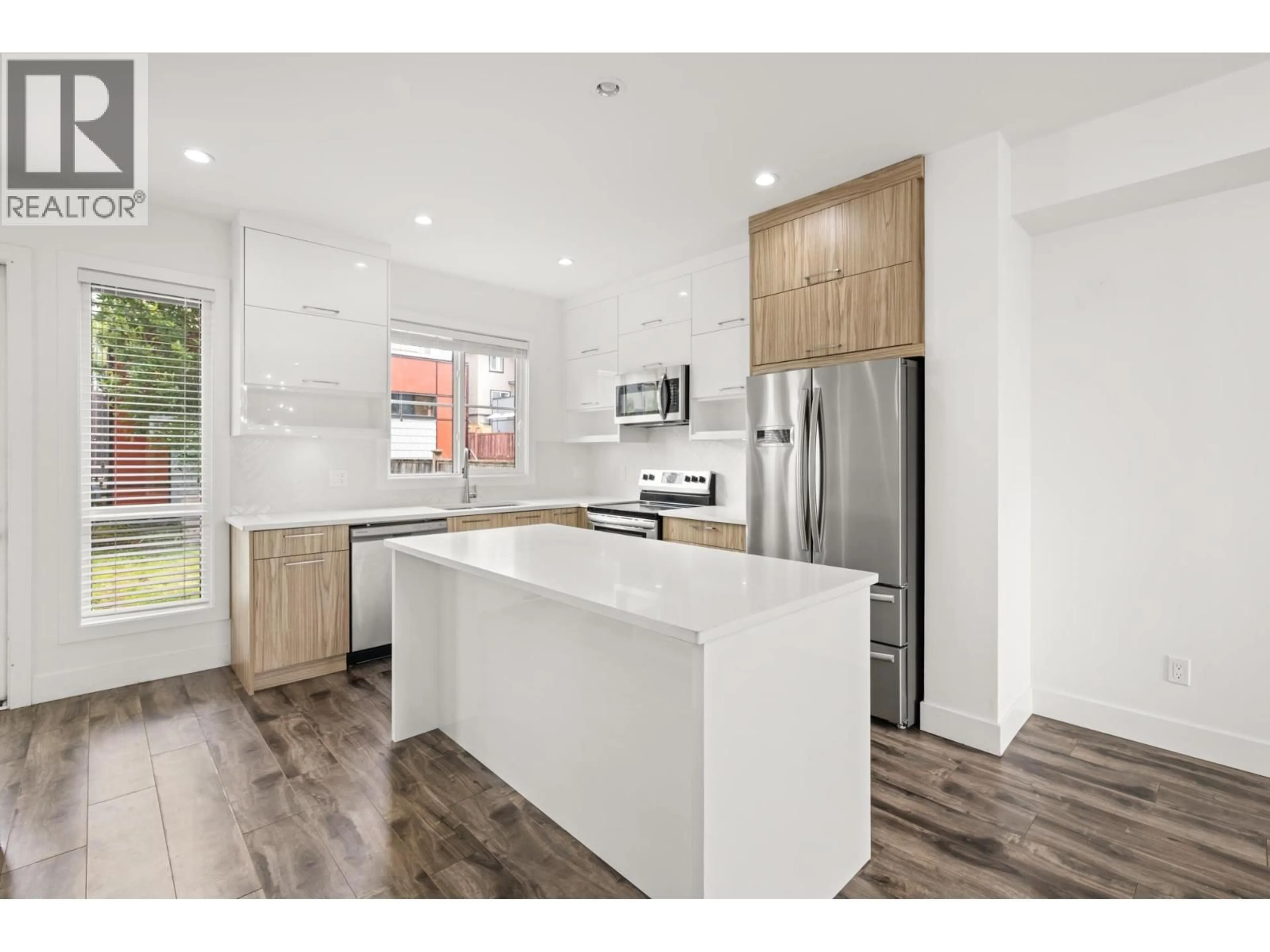 Open concept kitchen, unknown for 102 - 3423 ROXTON AVENUE, Coquitlam British Columbia V3B0G7