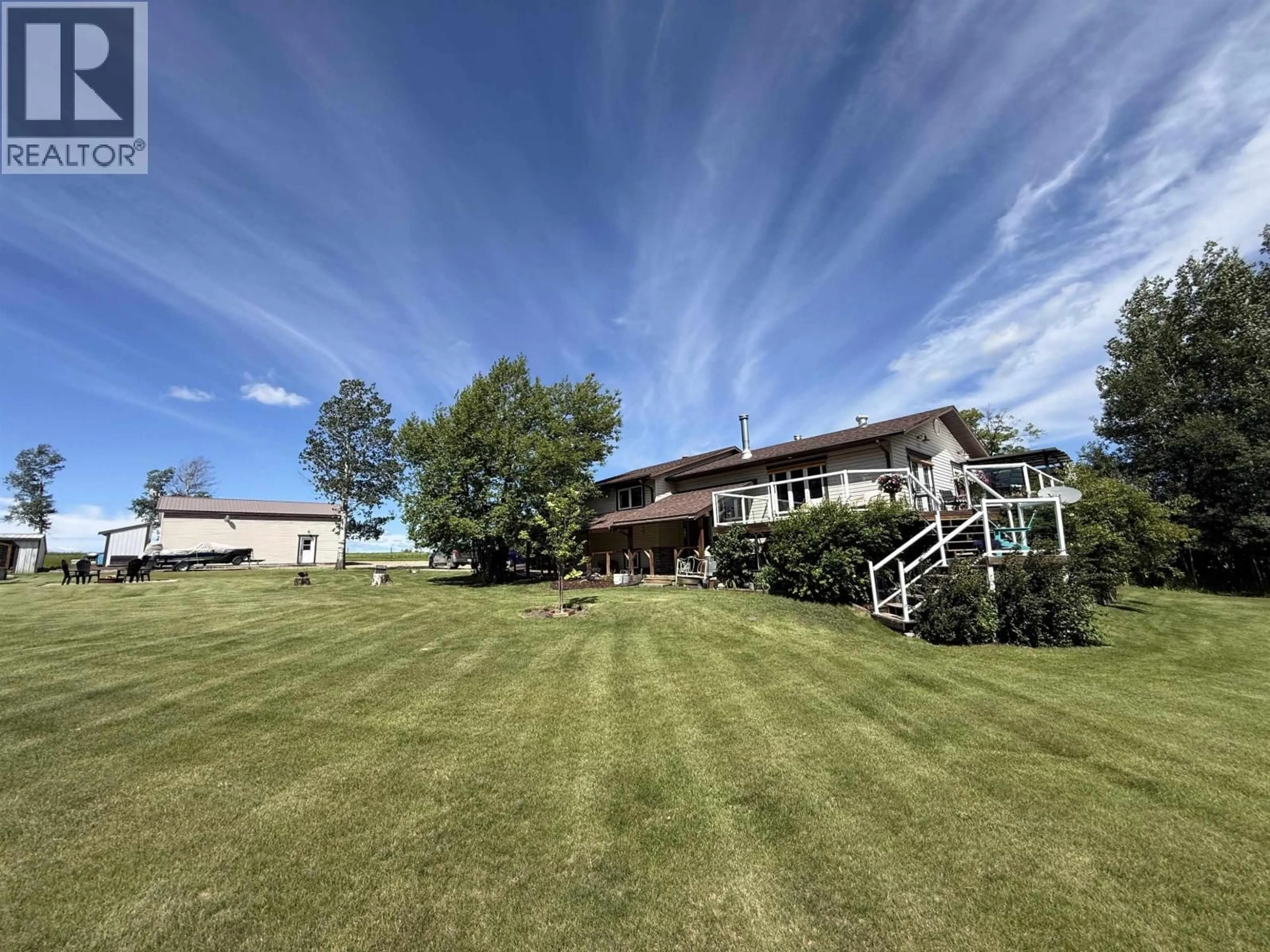 A pic from outside/outdoor area/front of a property/back of a property/a pic from drone, mountain view for 6417 NORTH PINE ROAD, Fort St. John British Columbia V0C2A0