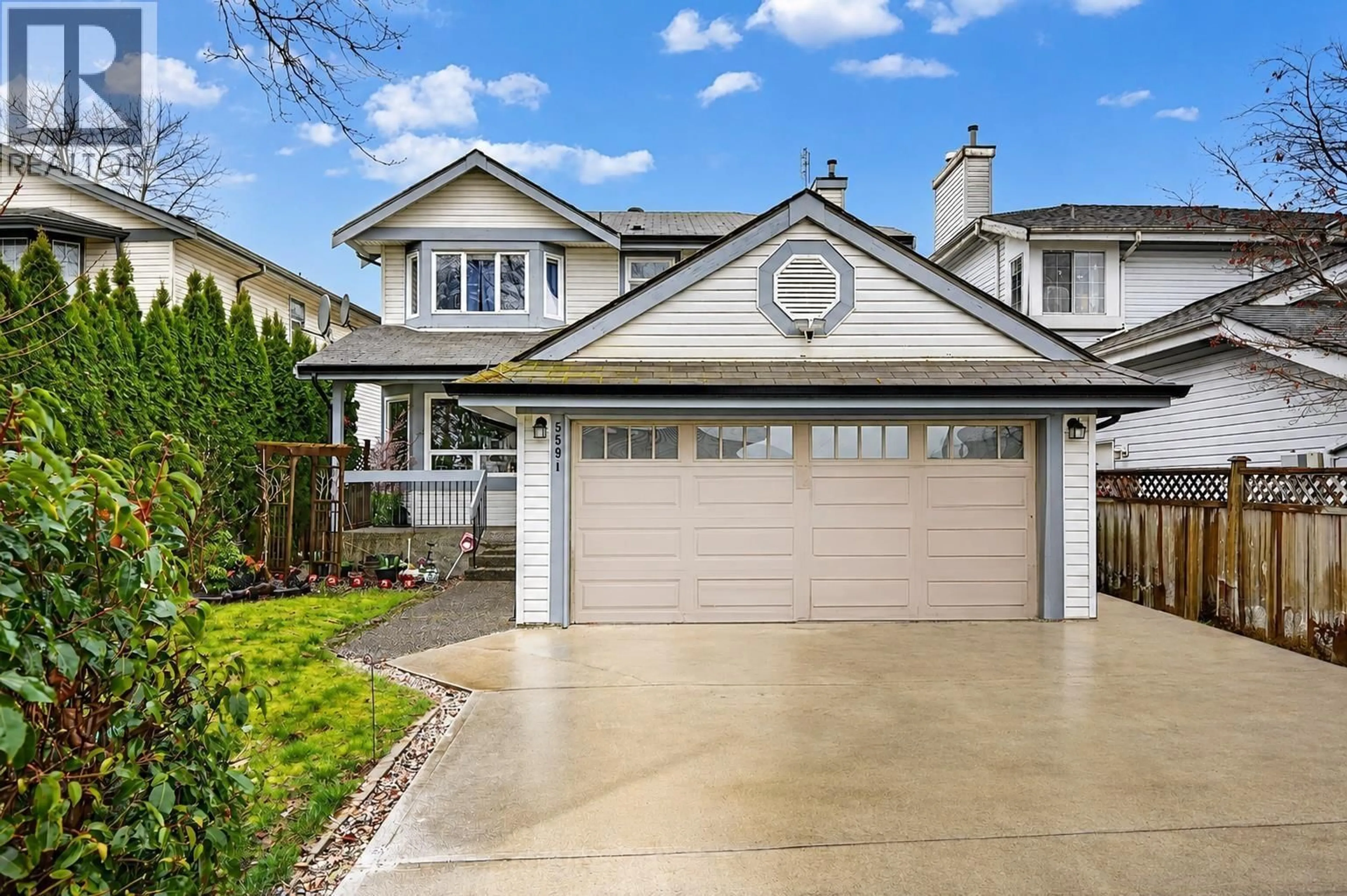 Home with vinyl exterior material, street for 5591 OLIVER DRIVE, Richmond British Columbia V6V2P2