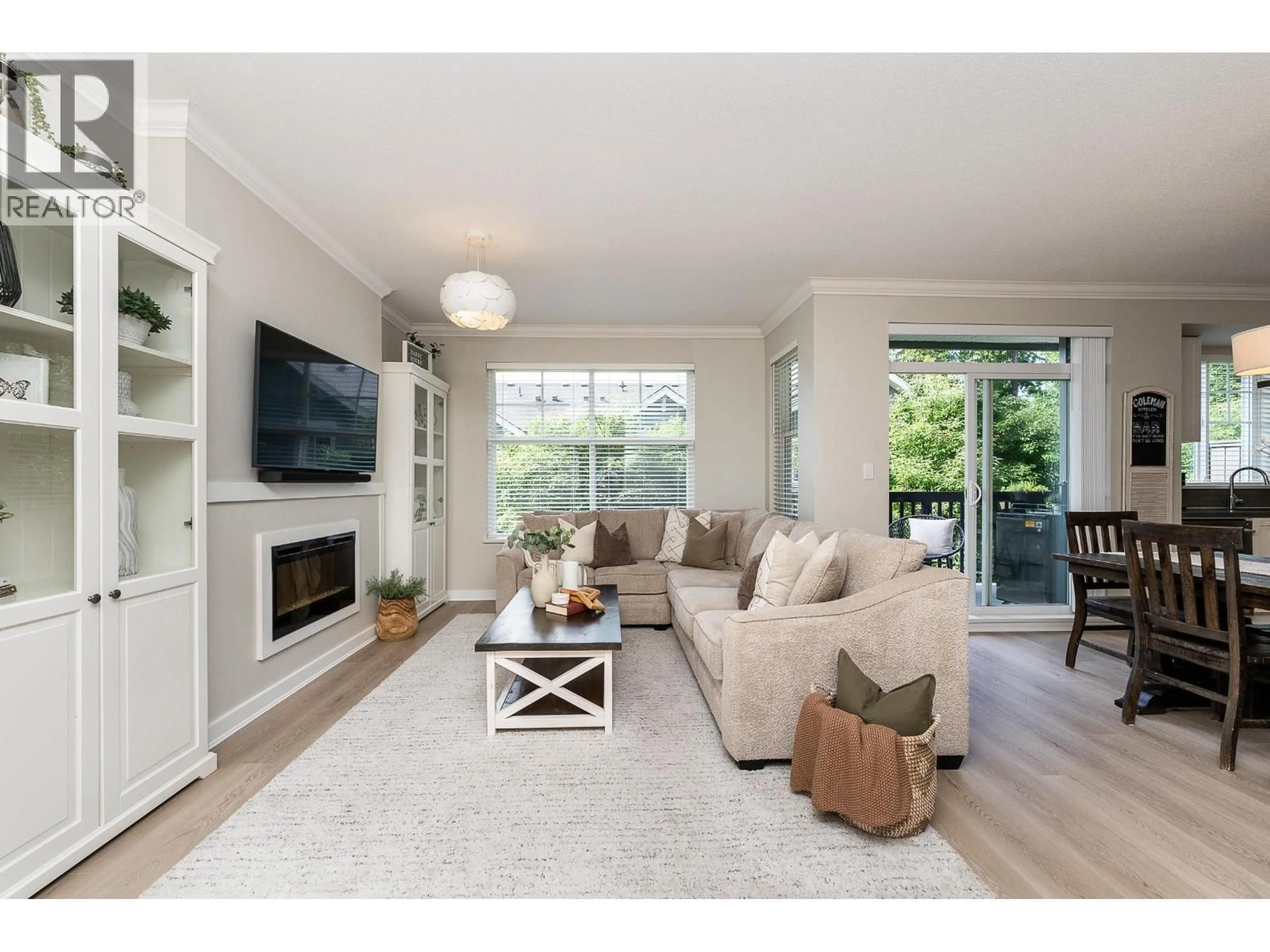 Living room with furniture, wood/laminate floor for 25 - 3461 PRINCETON AVENUE, Coquitlam British Columbia V3E0M2