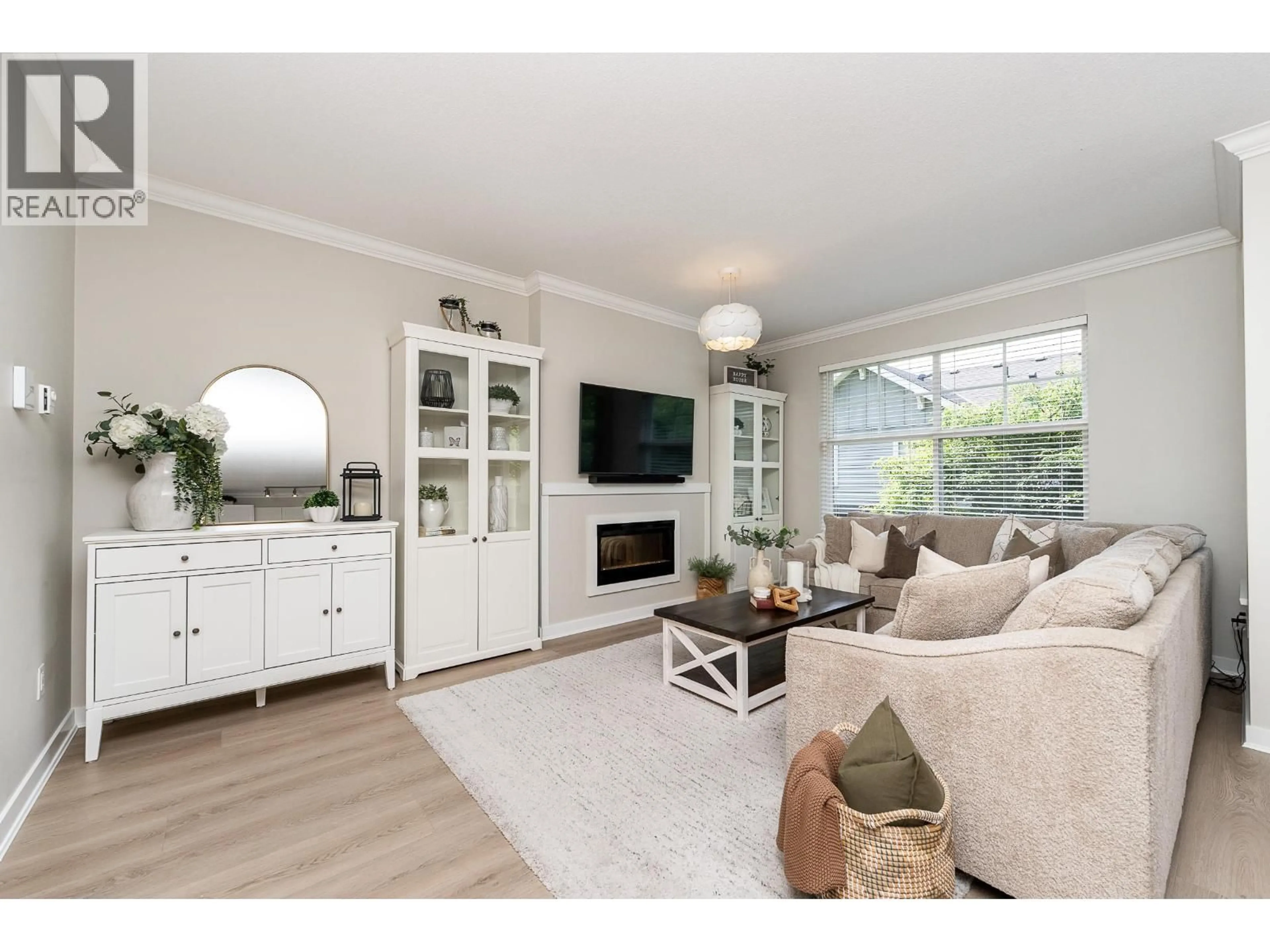 Living room with furniture, wood/laminate floor for 25 - 3461 PRINCETON AVENUE, Coquitlam British Columbia V3E0M2
