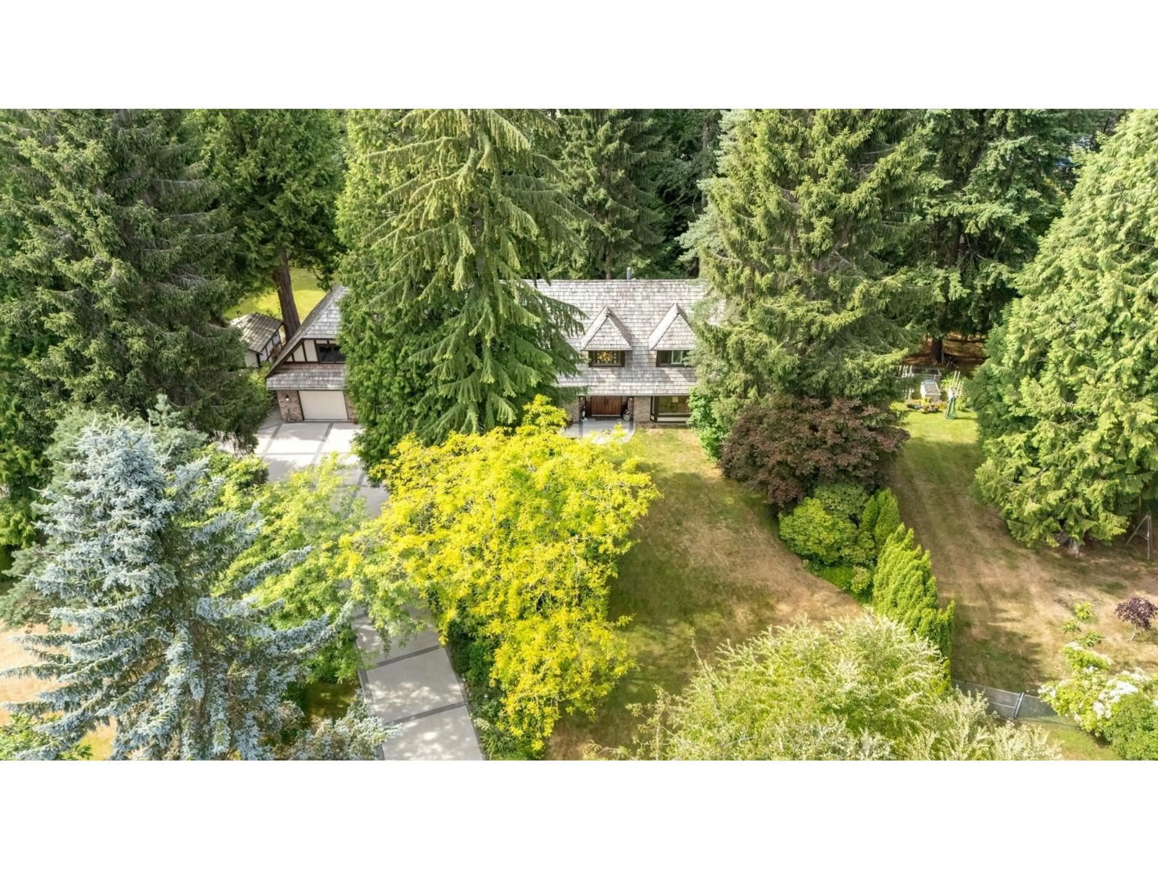 A pic from outside/outdoor area/front of a property/back of a property/a pic from drone, forest/trees view for 14325 25 AVENUE, Surrey British Columbia V4P1R7