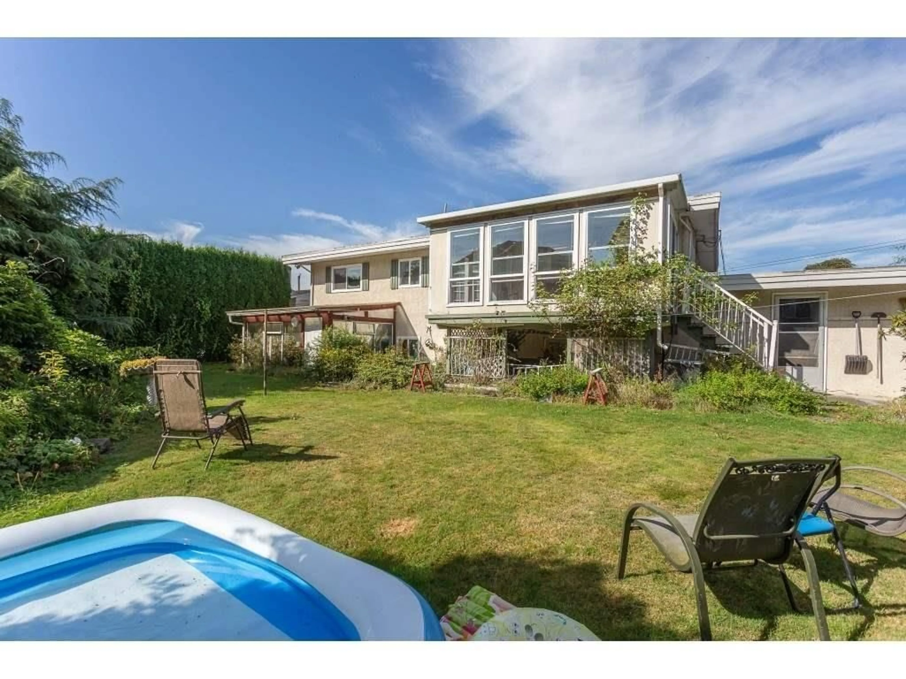 A pic from outside/outdoor area/front of a property/back of a property/a pic from drone, water/lake/river/ocean view for 10096 BONAVISTA STREET, Chilliwack British Columbia V2P5B9