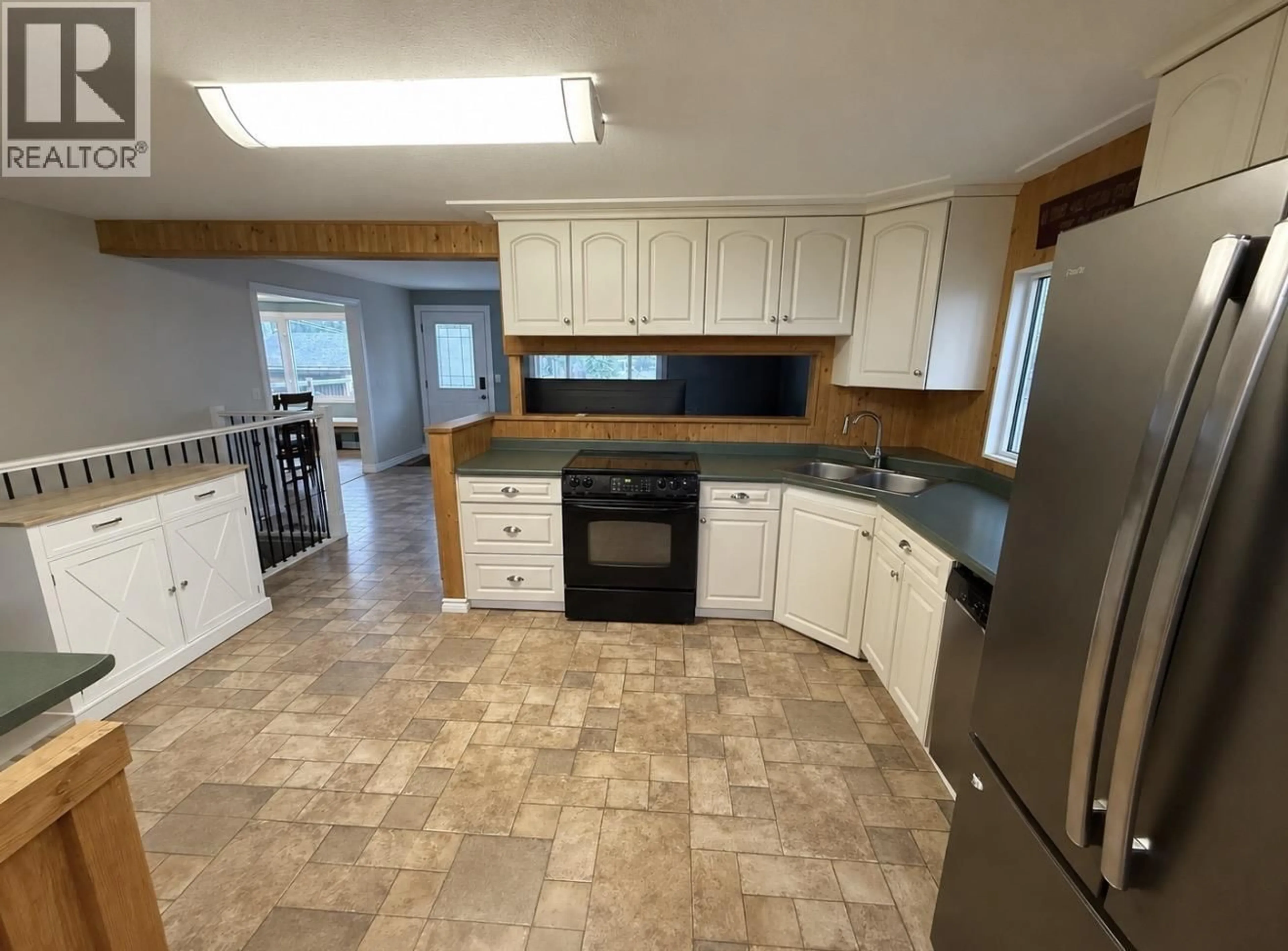 Open concept kitchen, ceramic/tile floor for 12776 PEACH AVENUE, Charlie Lake British Columbia V0C1H0