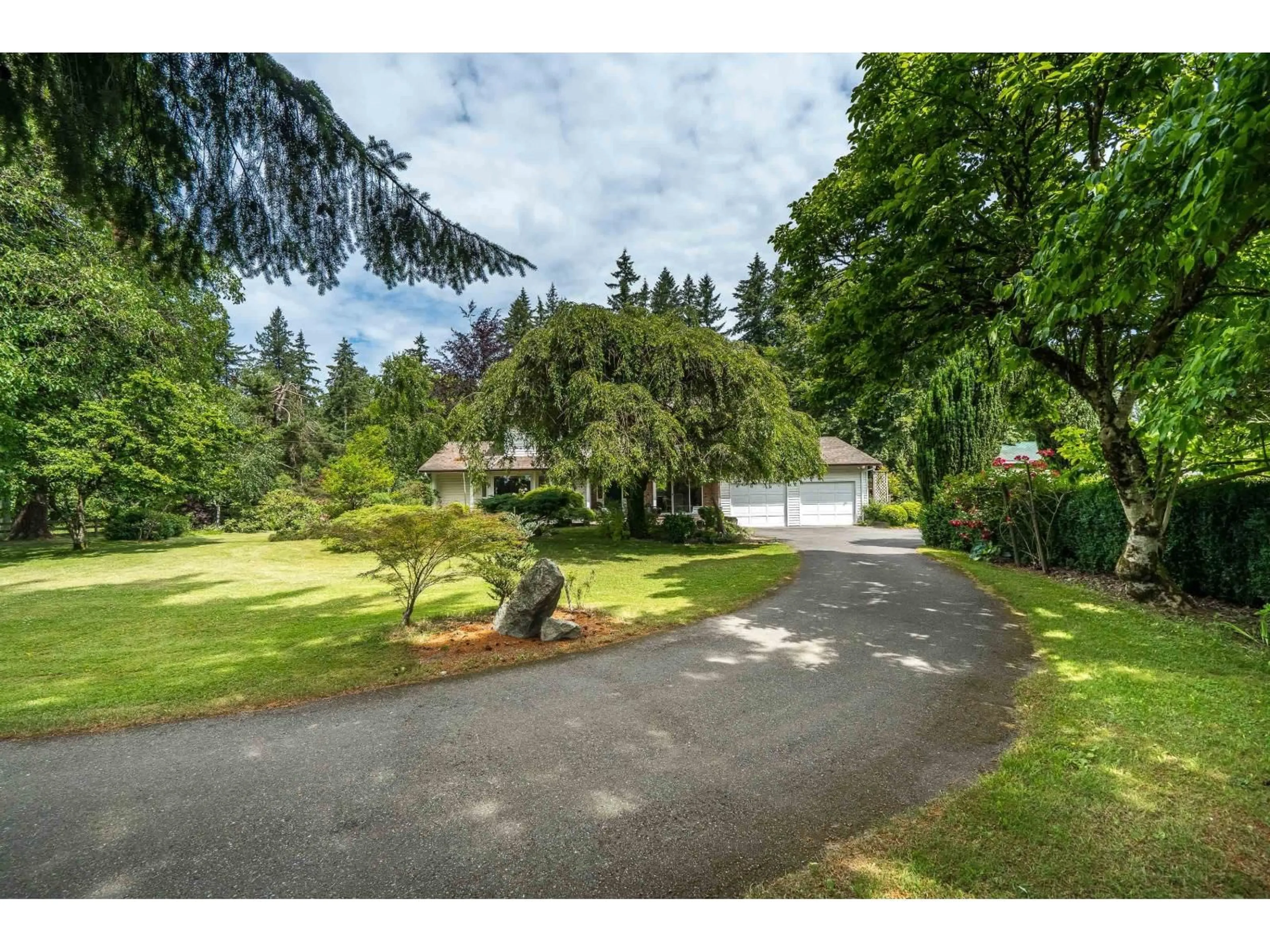 A pic from outside/outdoor area/front of a property/back of a property/a pic from drone, street for 7538 240 STREET, Langley British Columbia V1M3P8