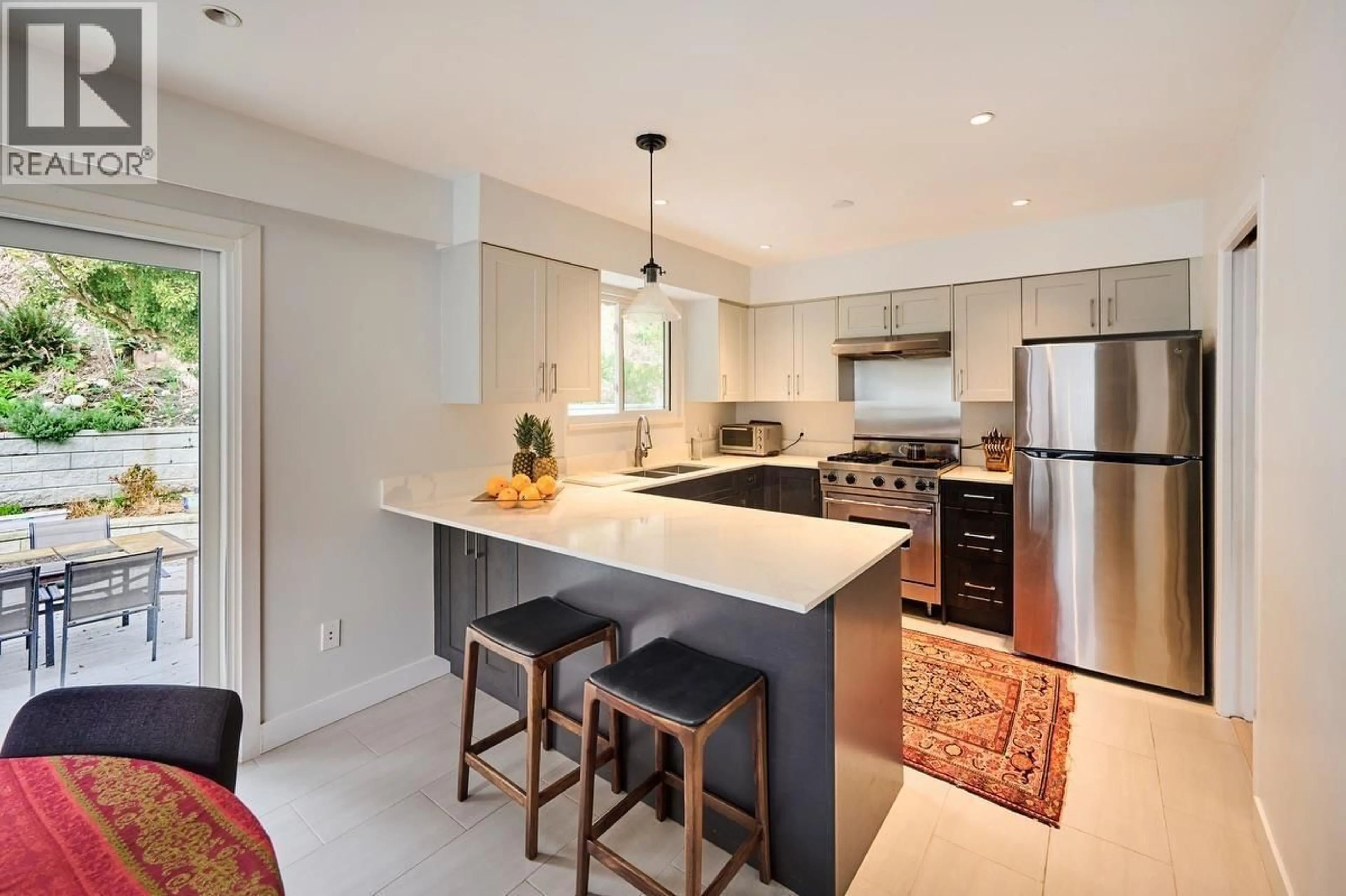 Open concept kitchen, ceramic/tile floor for 809 SEYMOUR BOULEVARD, North Vancouver British Columbia V7J3S7