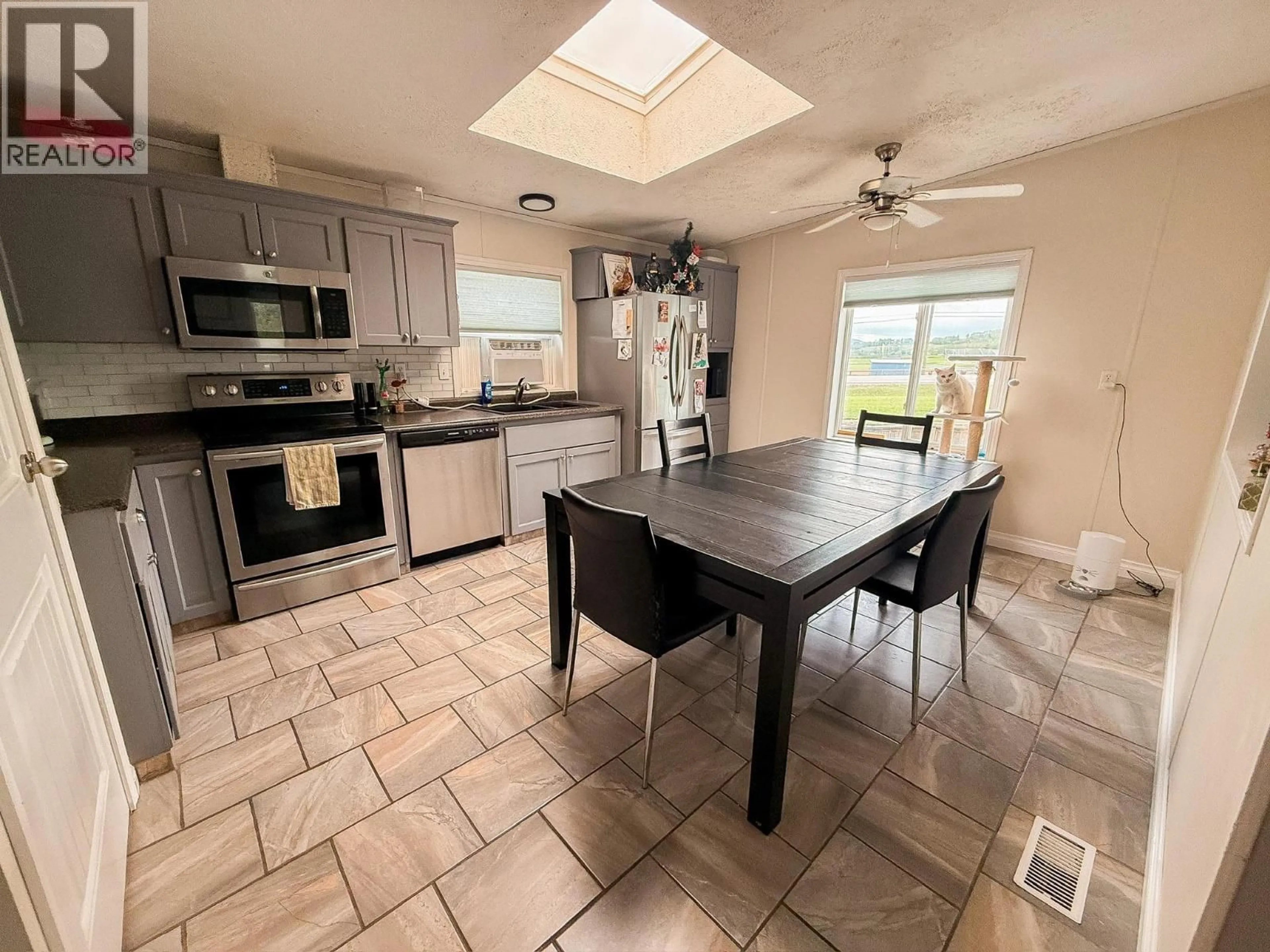 Open concept kitchen, ceramic/tile floor for 9805 98 AVENUE, Taylor British Columbia V0C2K0