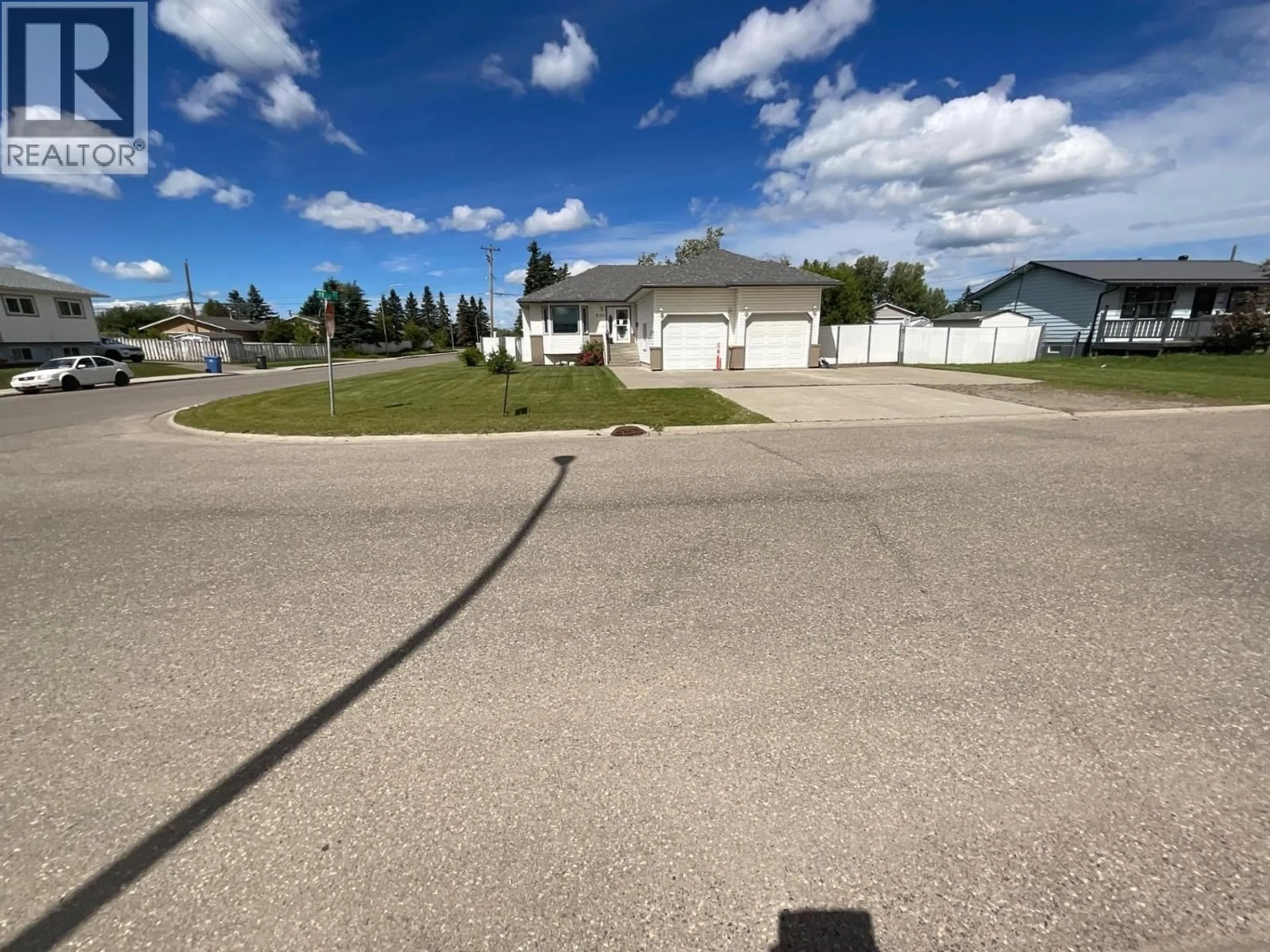 A pic from outside/outdoor area/front of a property/back of a property/a pic from drone, street for 8144 98 AVENUE, Fort St. John British Columbia V1J1P3