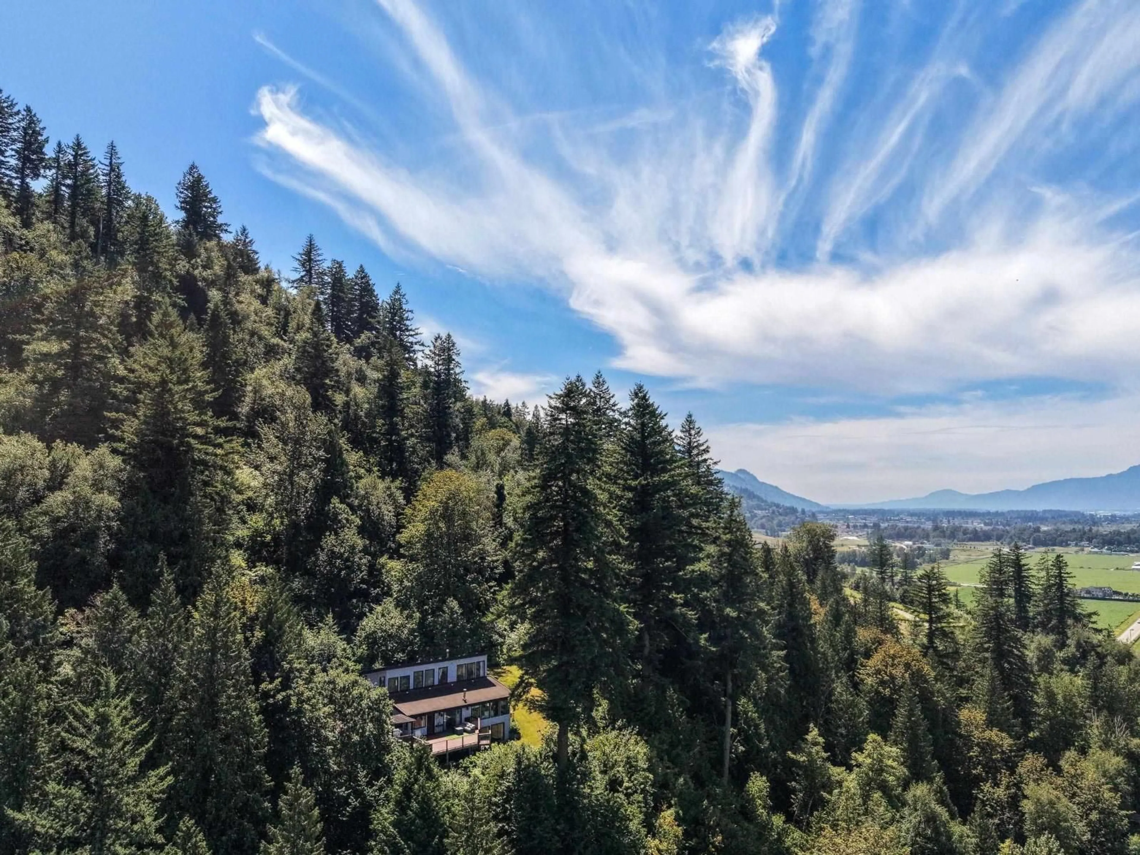 A pic from outside/outdoor area/front of a property/back of a property/a pic from drone, forest/trees view for 47750 ELK VIEW ROAD, Chilliwack British Columbia V2R4S5