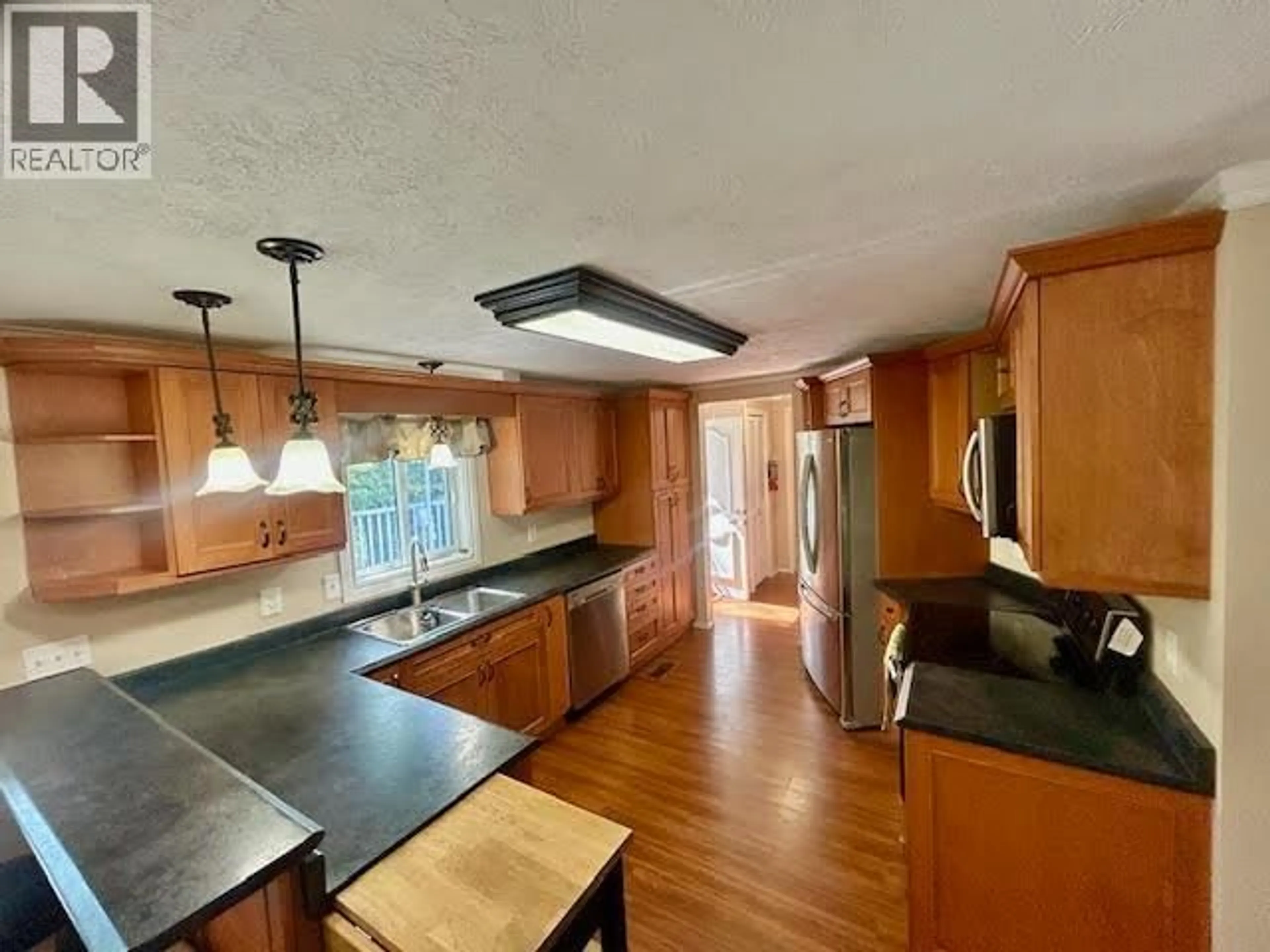 Open concept kitchen, unknown for 5544 53 STREET, Fort Nelson British Columbia V0C1R0