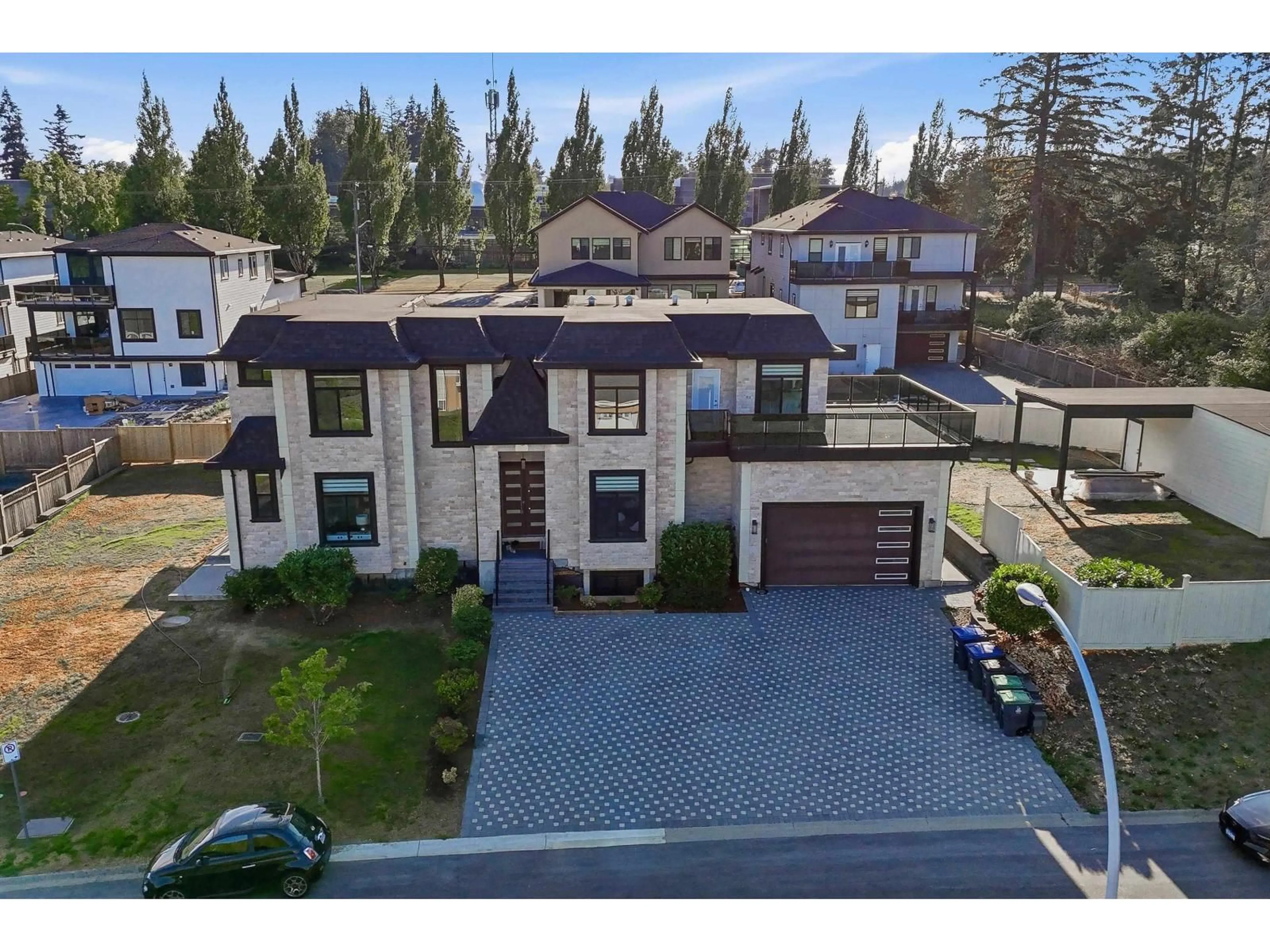 A pic from outside/outdoor area/front of a property/back of a property/a pic from drone, street for 5735 144A STREET, Surrey British Columbia V3S8E2