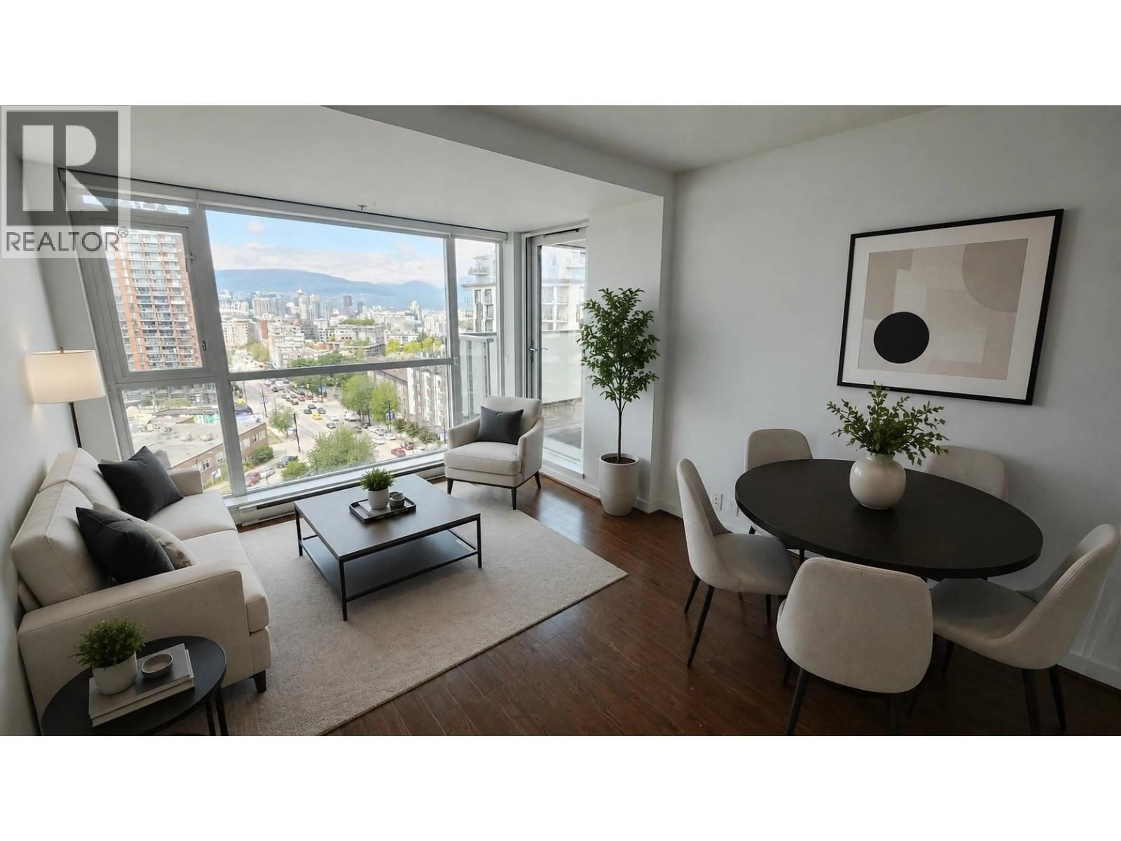 Living room with furniture, wood/laminate floor for 1003 - 2770 SOPHIA STREET, Vancouver British Columbia V5T0A4