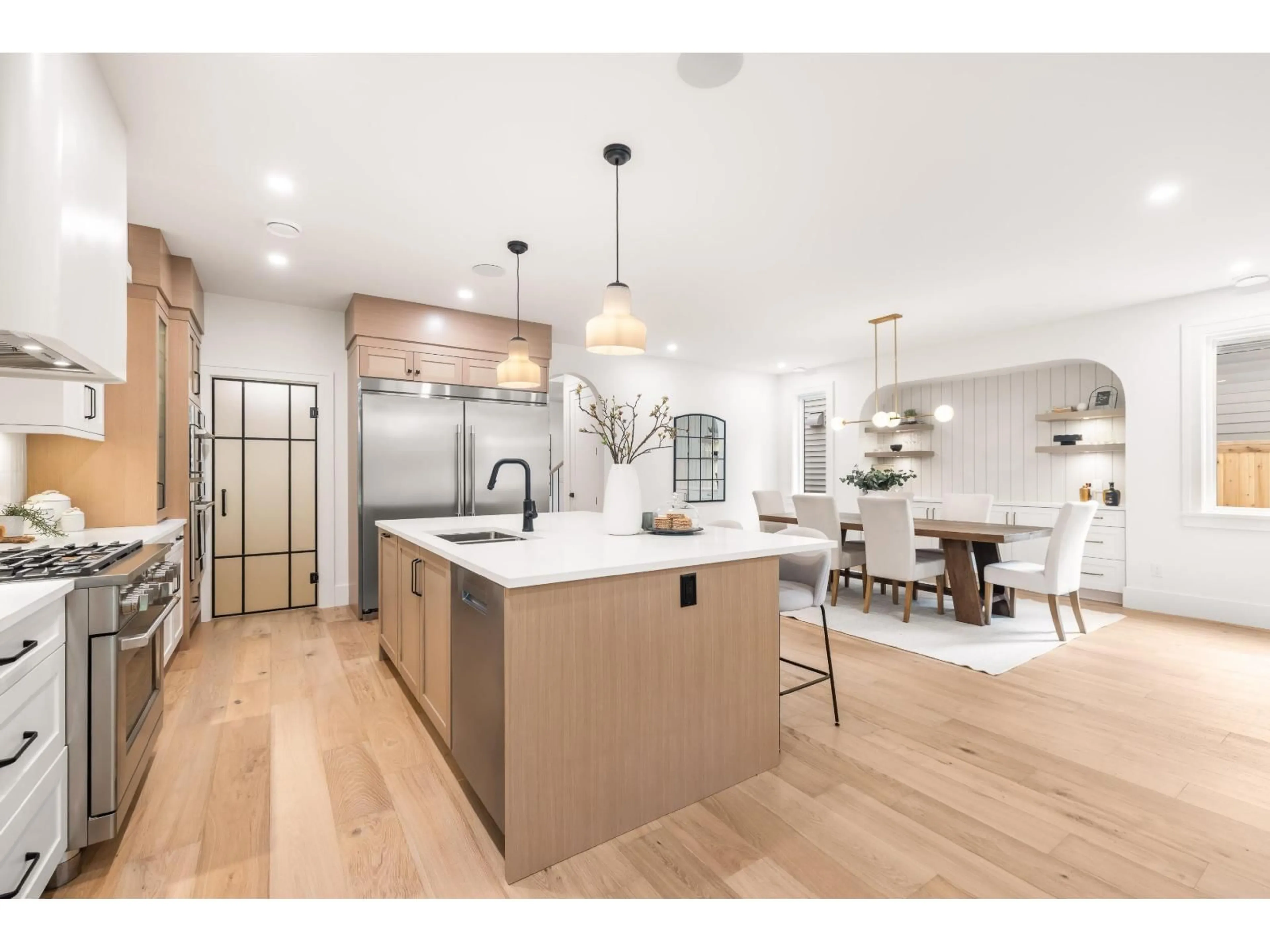 Open concept kitchen, wood/laminate floor for 4347 232 STREET, Langley British Columbia V2Z2H7