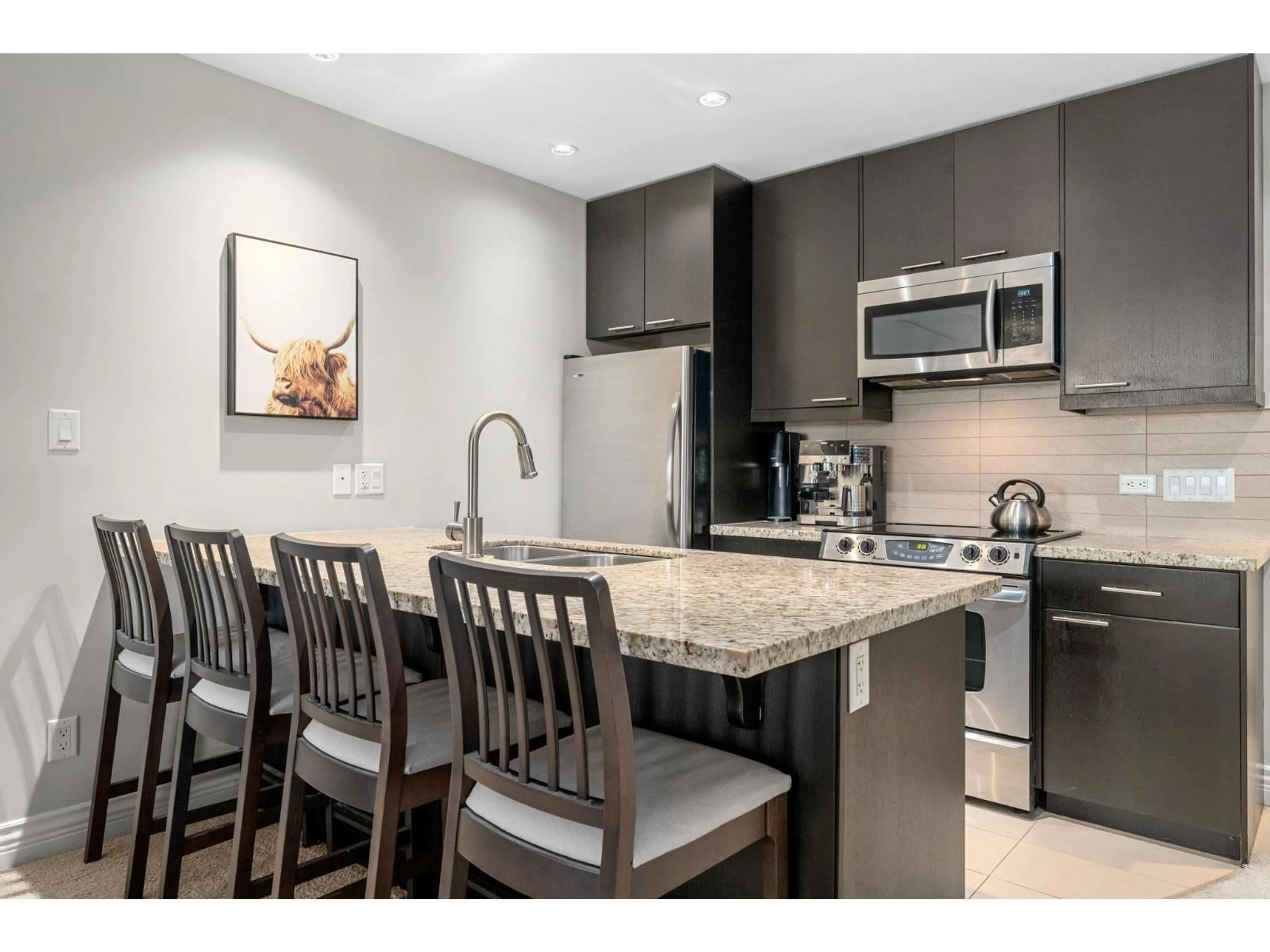 Open concept kitchen, unknown for 203 - 2970 KING GEORGE BOULEVARD, Surrey British Columbia V4P0E6