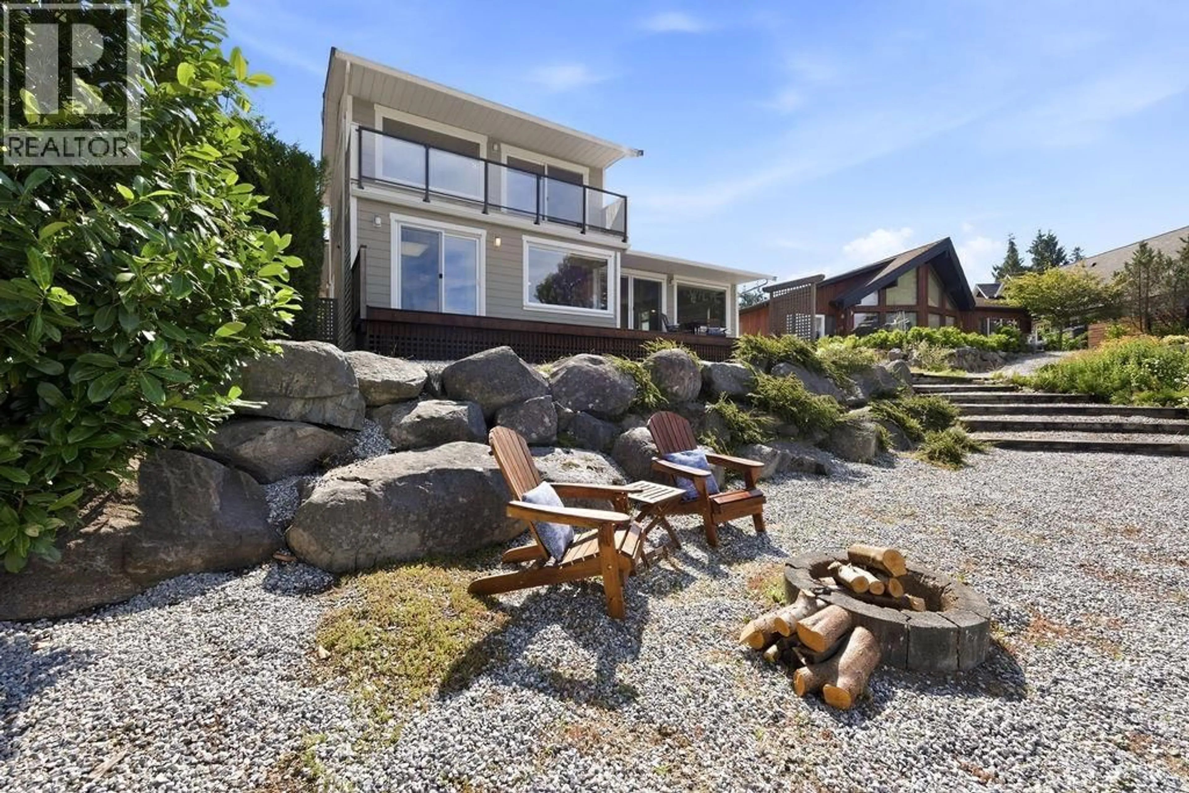 A pic from outside/outdoor area/front of a property/back of a property/a pic from drone, unknown for 6343 MARMOT ROAD, Sechelt British Columbia V7Z0L2