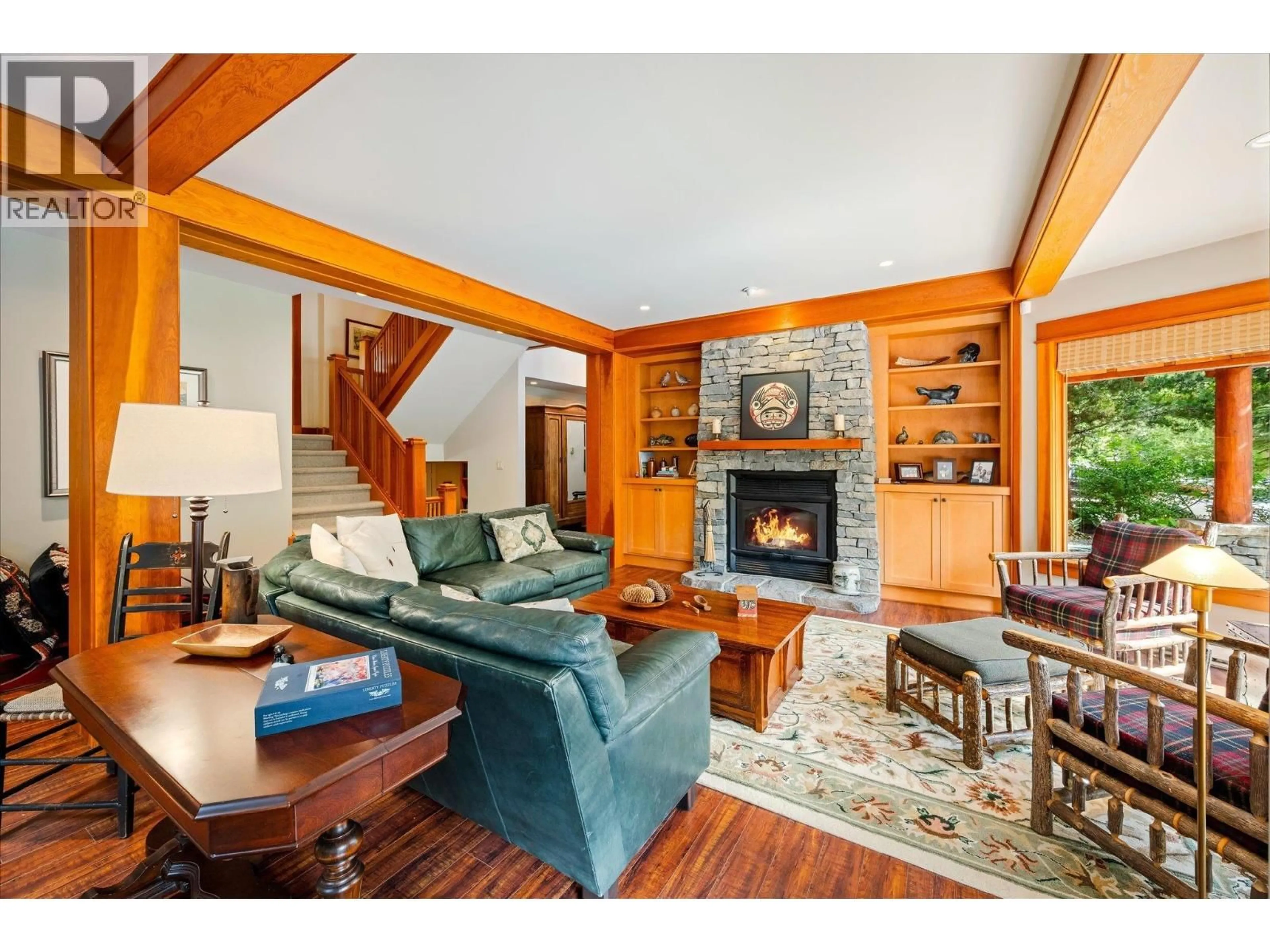 Living room with furniture, wood/laminate floor for 9583 EMERALD DRIVE, Whistler British Columbia V8E0G5