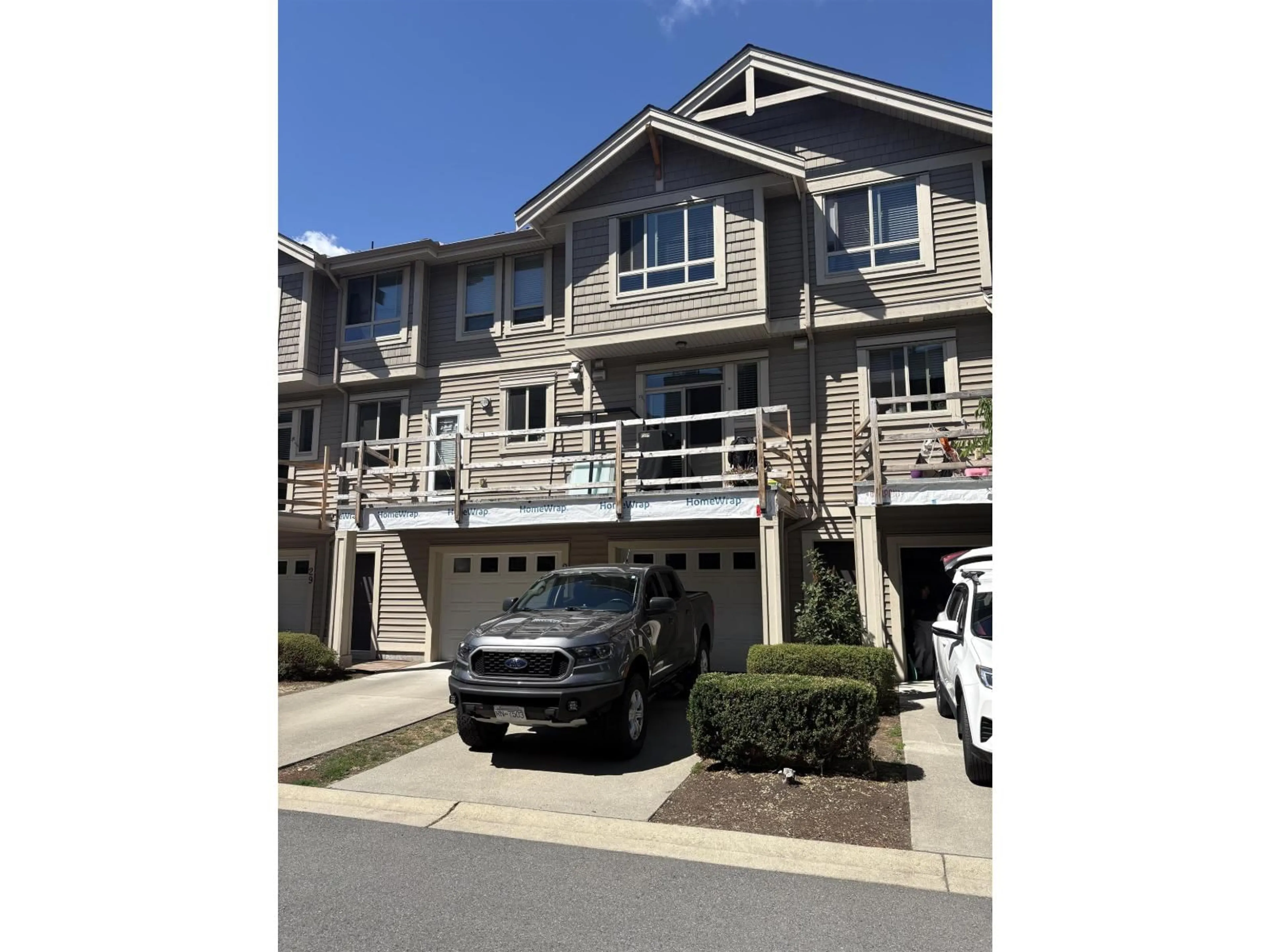 A pic from outside/outdoor area/front of a property/back of a property/a pic from drone, street for 27 - 19752 55A AVENUE, Langley British Columbia V3A3X2