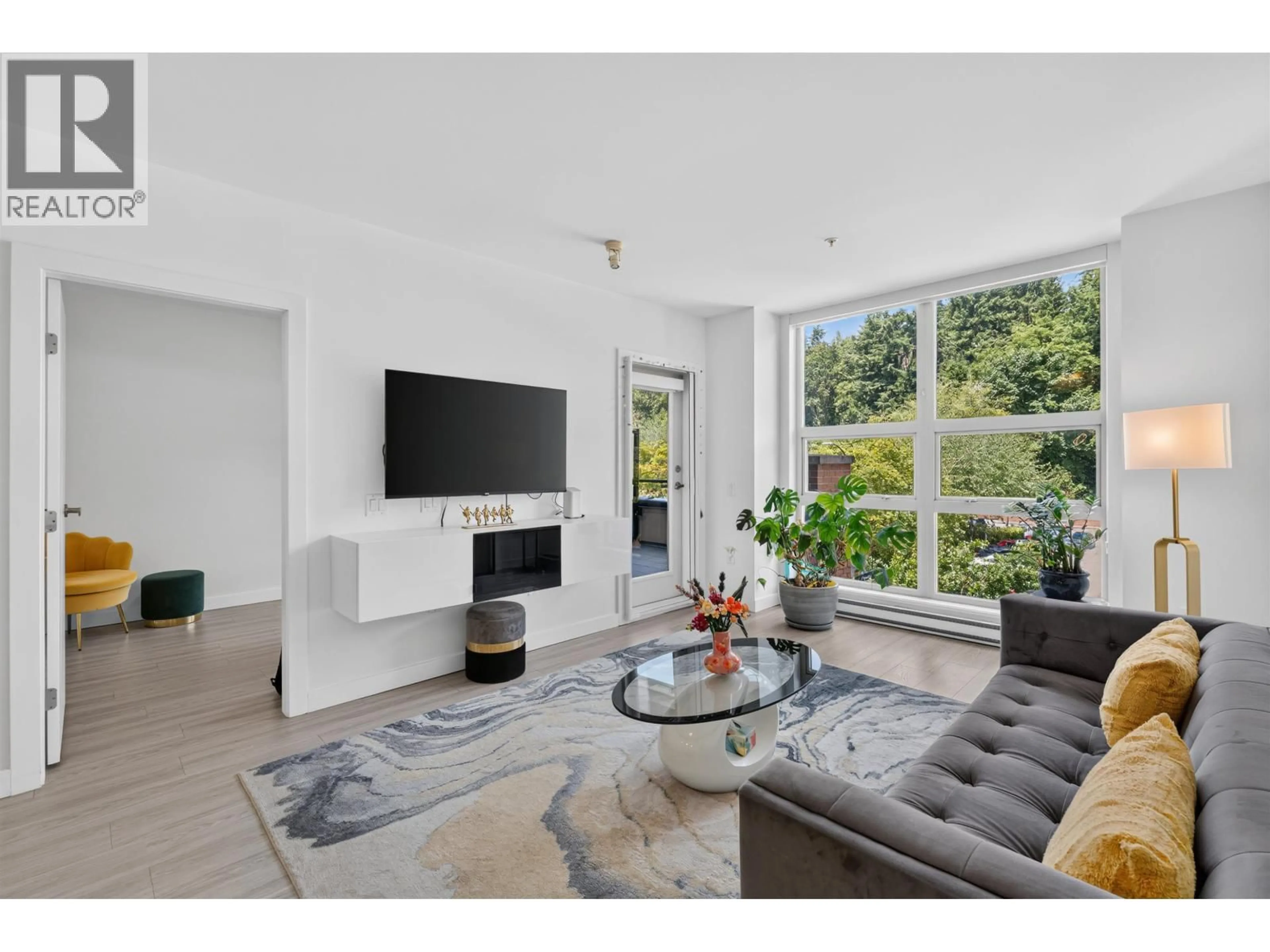 Living room with furniture, unknown for 305 - 1177 MARINE DRIVE, North Vancouver British Columbia V7P1T1