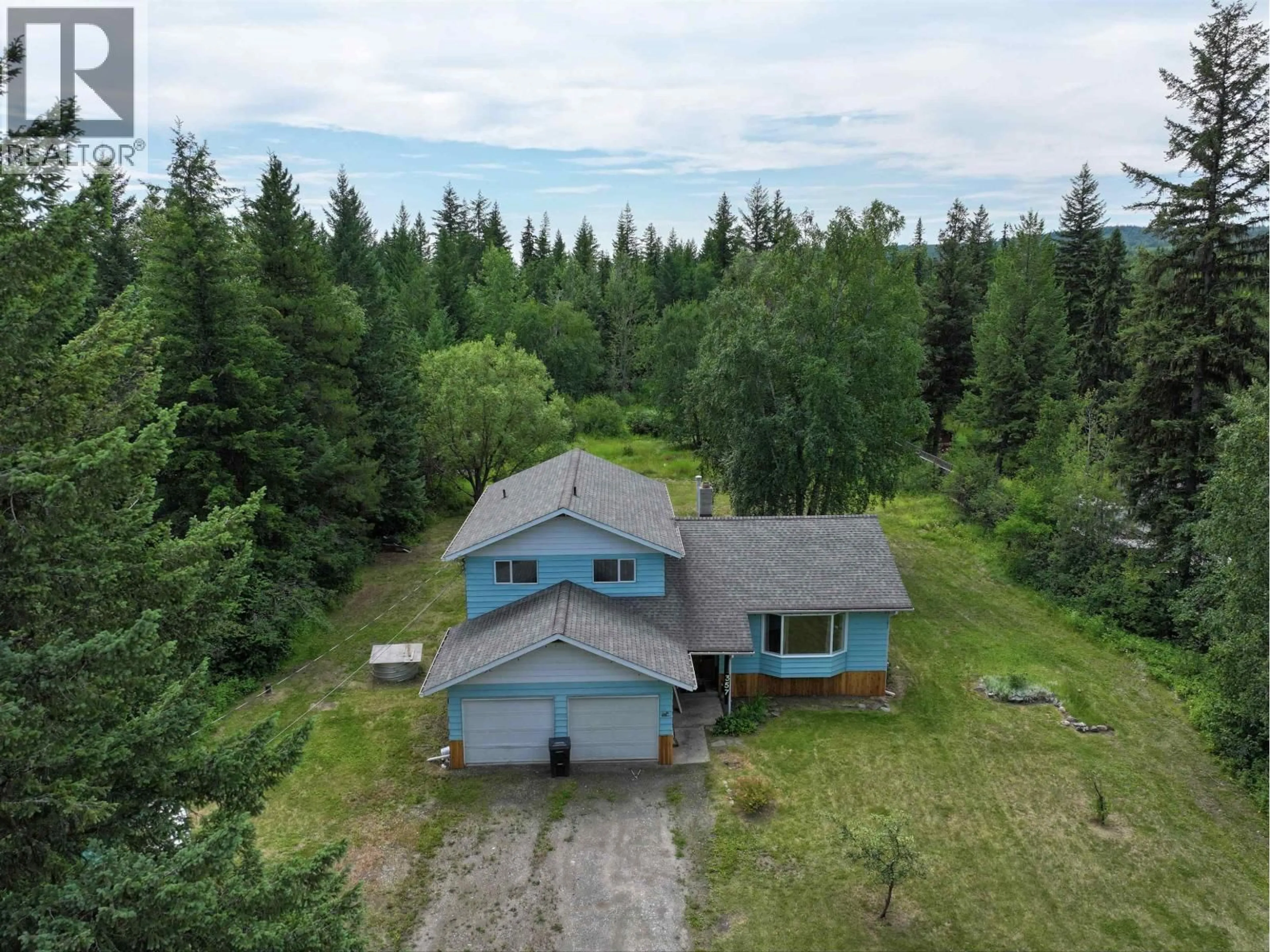 A pic from outside/outdoor area/front of a property/back of a property/a pic from drone, forest/trees view for 357 CARAGANA ROAD, Quesnel British Columbia V2J5P1