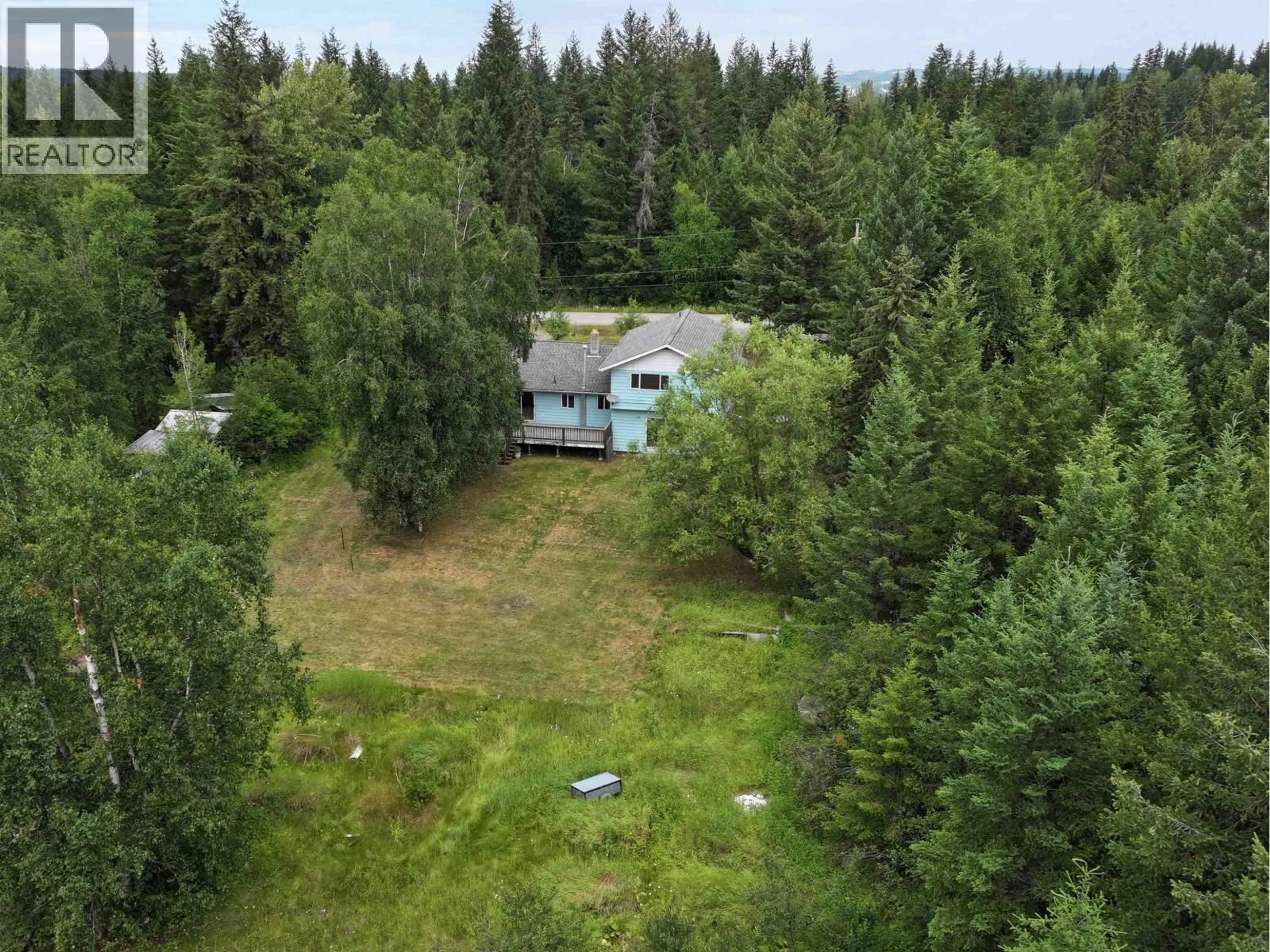 A pic from outside/outdoor area/front of a property/back of a property/a pic from drone, forest/trees view for 357 CARAGANA ROAD, Quesnel British Columbia V2J5P1