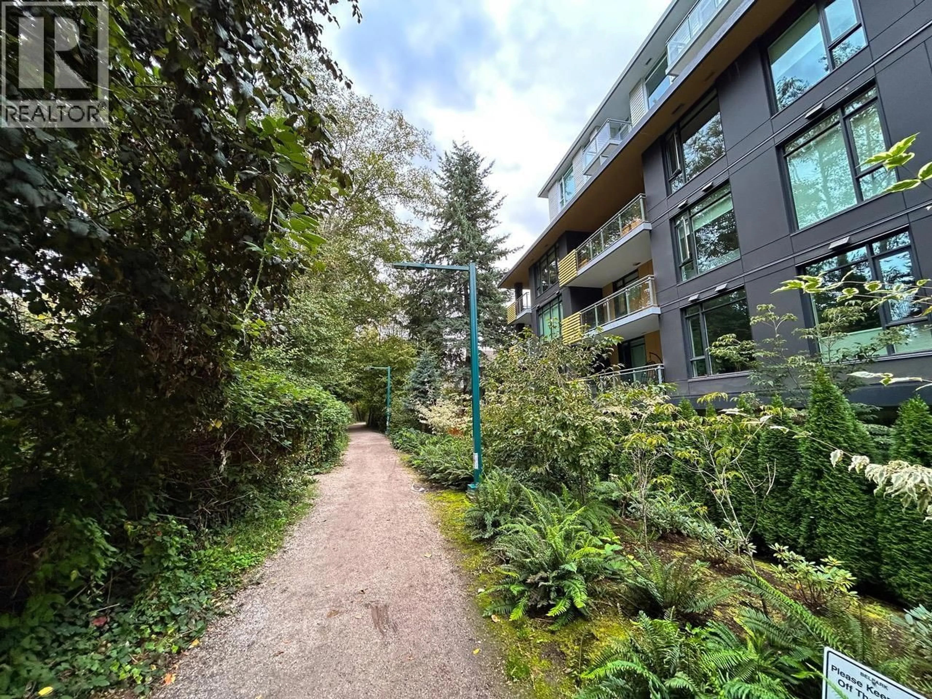 A pic from outside/outdoor area/front of a property/back of a property/a pic from drone, forest/trees view for 609 - 7428 ALBERTA STREET, Vancouver British Columbia V5X0J5