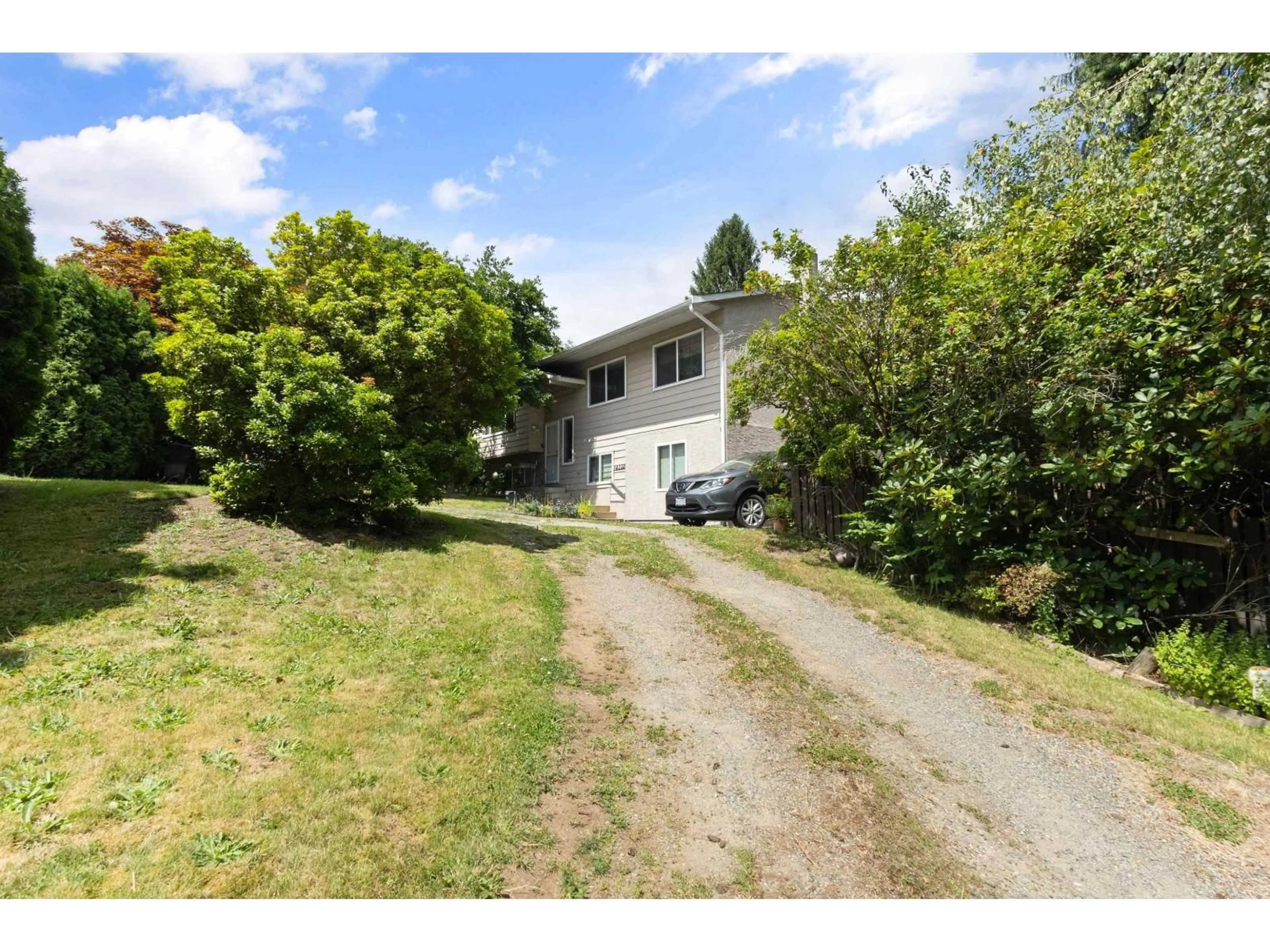 A pic from outside/outdoor area/front of a property/back of a property/a pic from drone, street for 34107 MARSHALL ROAD, Abbotsford British Columbia V2S1L8