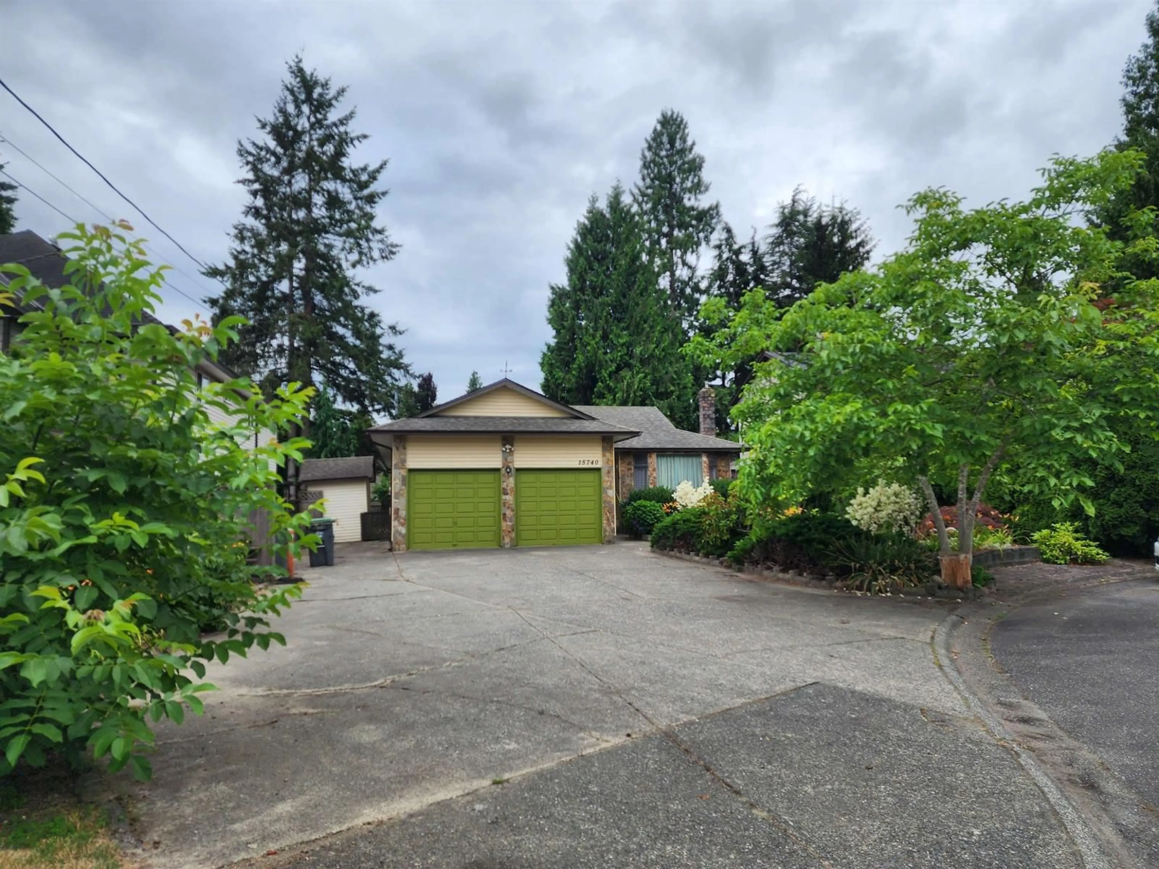 A pic from outside/outdoor area/front of a property/back of a property/a pic from drone, street for 15740 99 AVENUE, Surrey British Columbia V4N2A2
