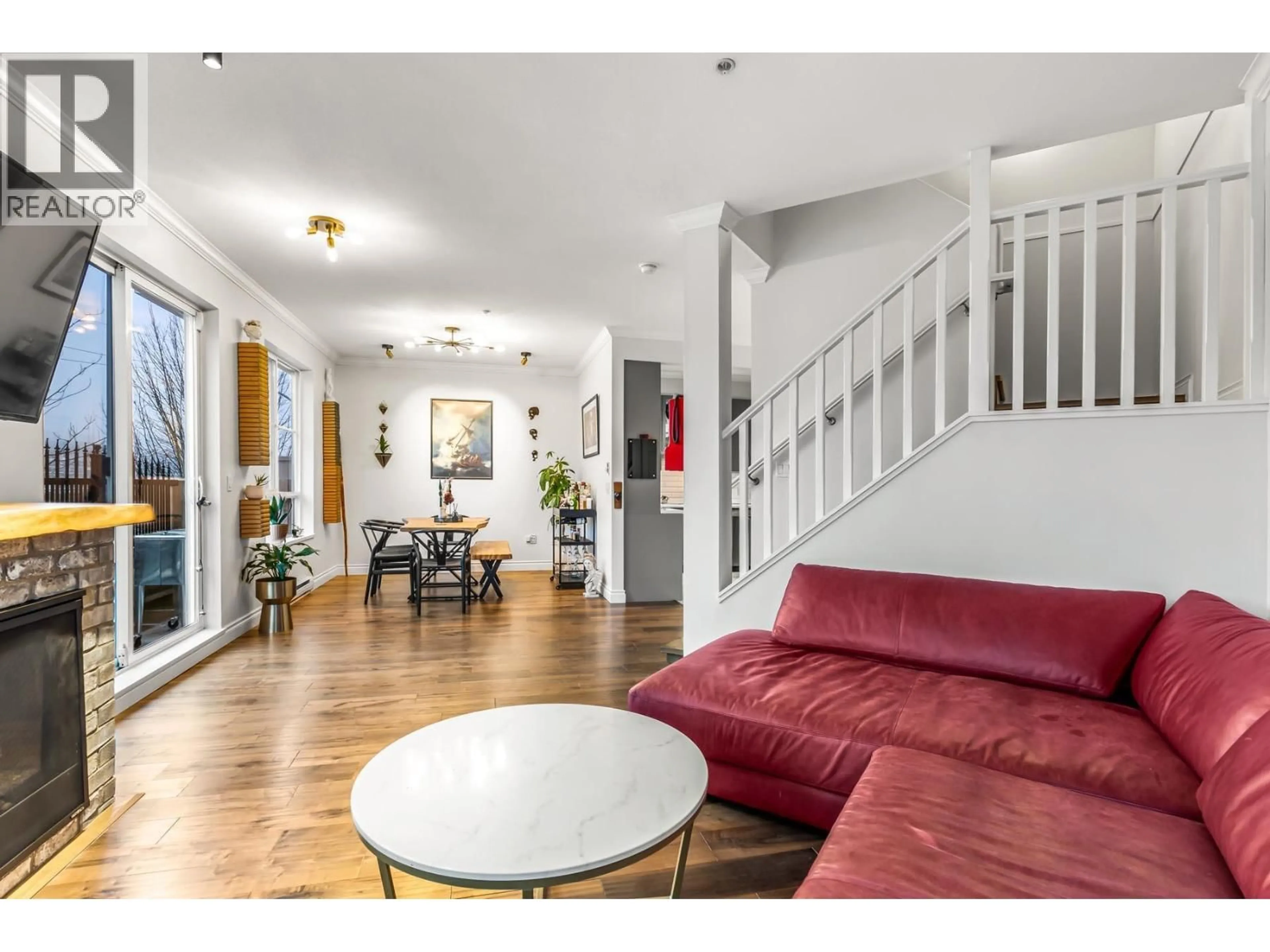 Living room with furniture, unknown for 204 - 815 FIRST STREET, New Westminster British Columbia V3L2H7