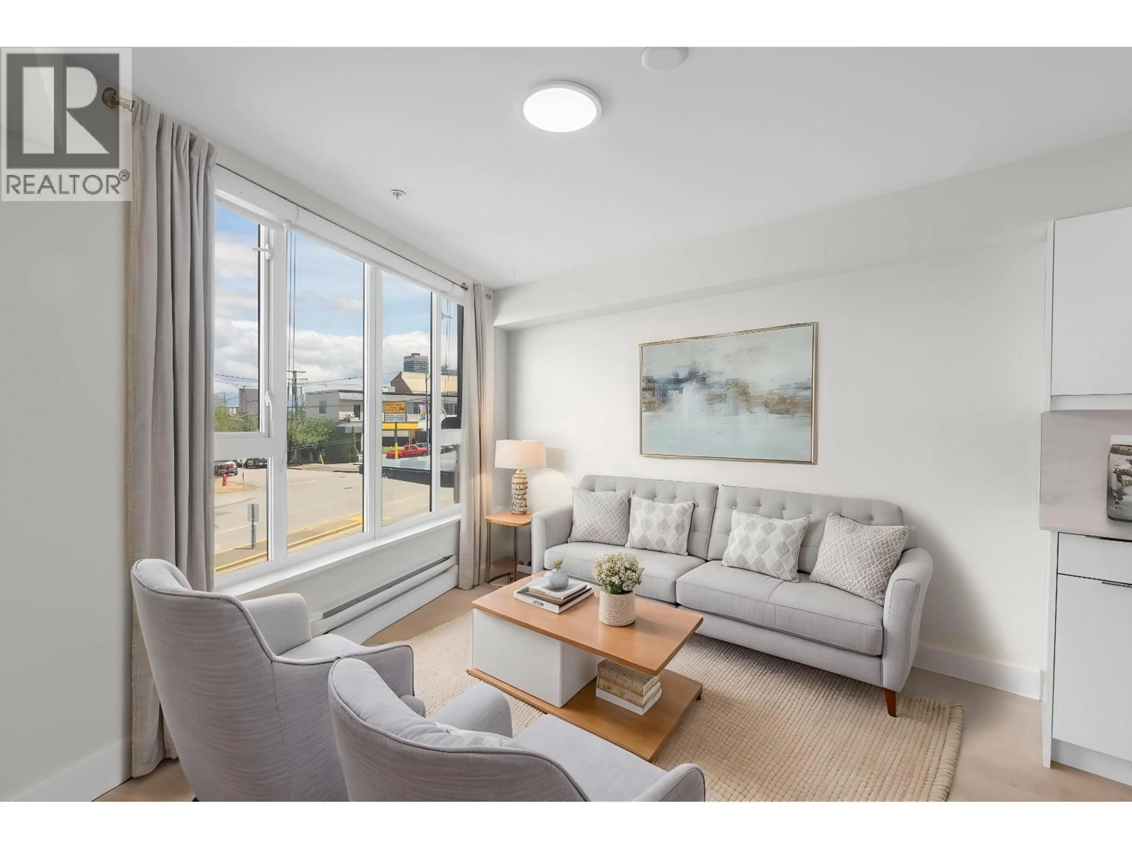 Living room with furniture, unknown for 207 - 3050 KINGSWAY, Vancouver British Columbia V5R5J7