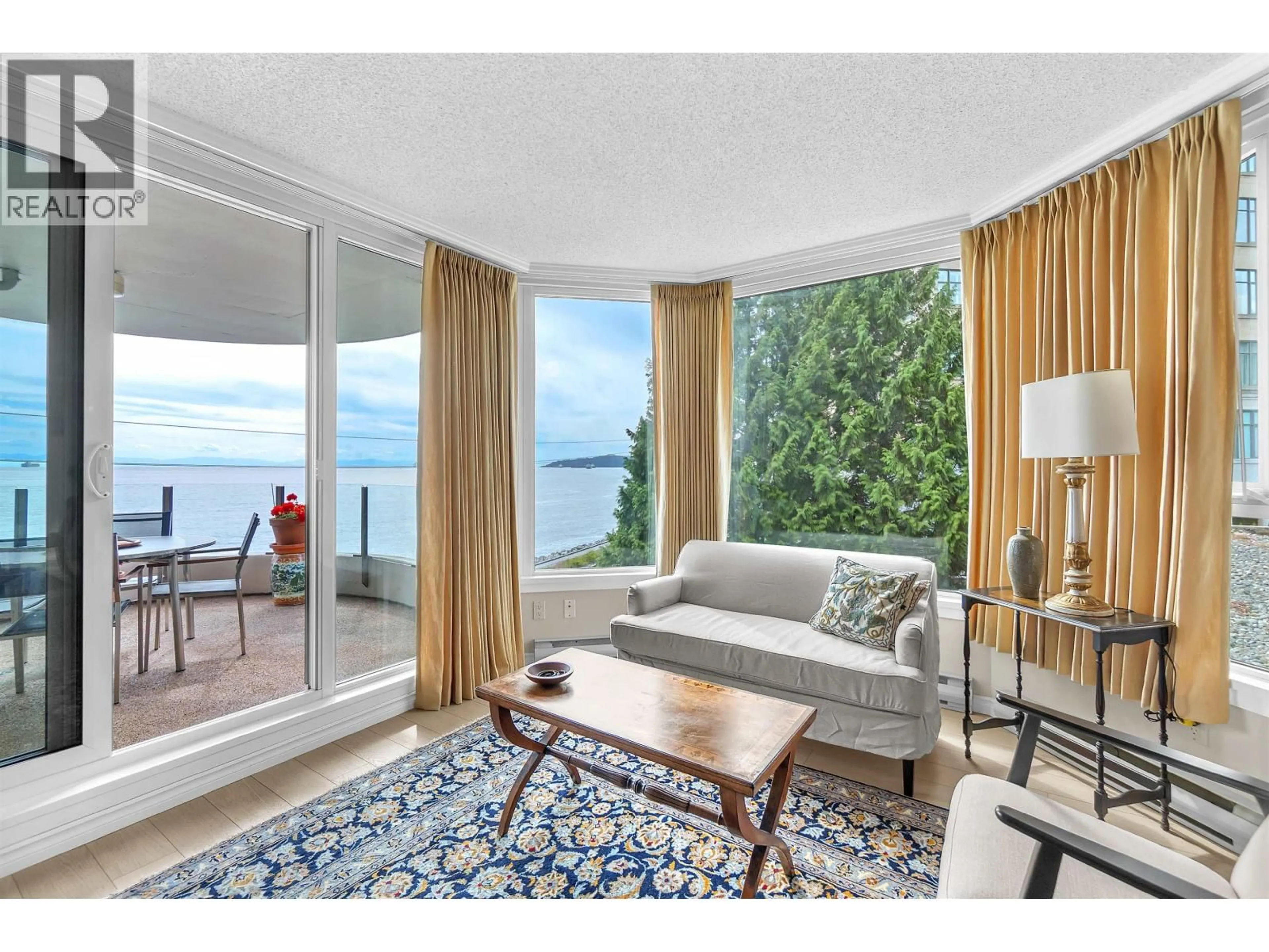 Living room with furniture, unknown for 103 - 2280 BELLEVUE AVENUE, West Vancouver British Columbia V7V1C6