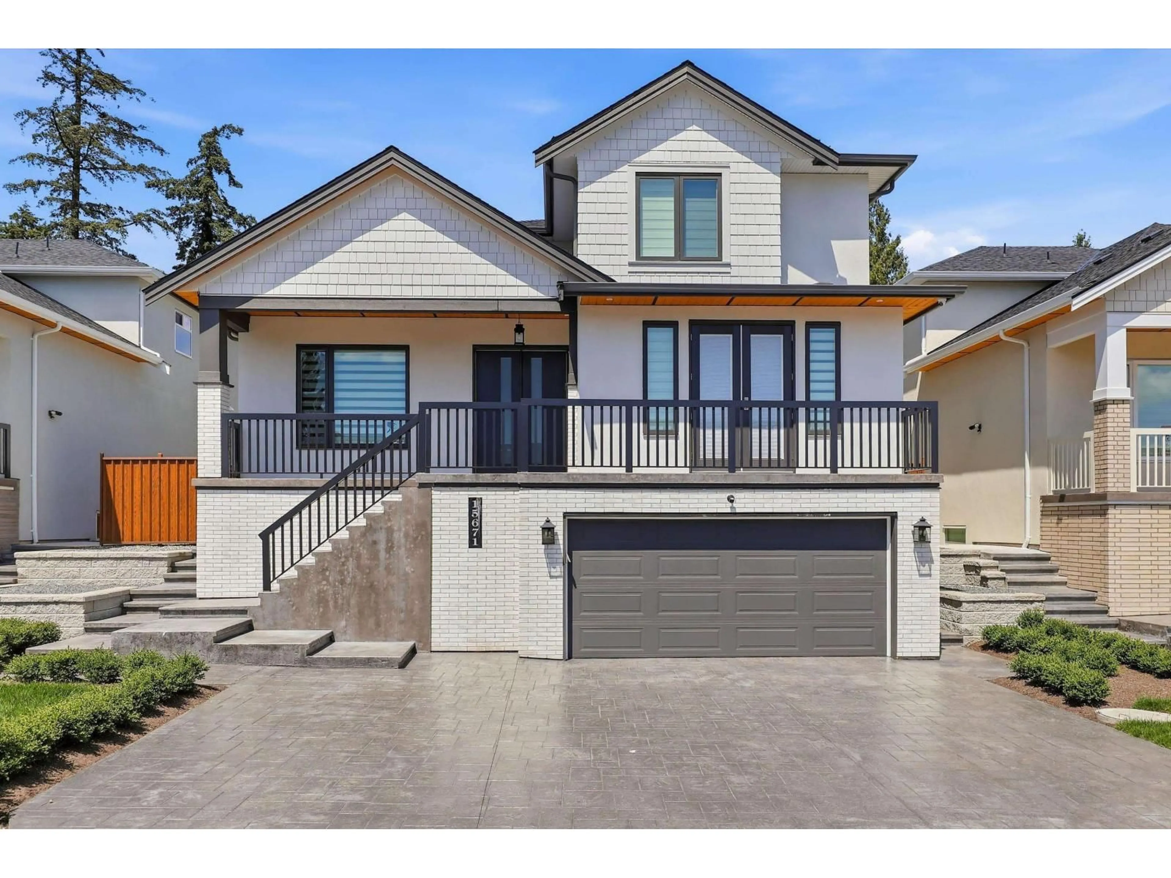 Home with vinyl exterior material, street for 15671 82 AVENUE, Surrey British Columbia V4N0R9