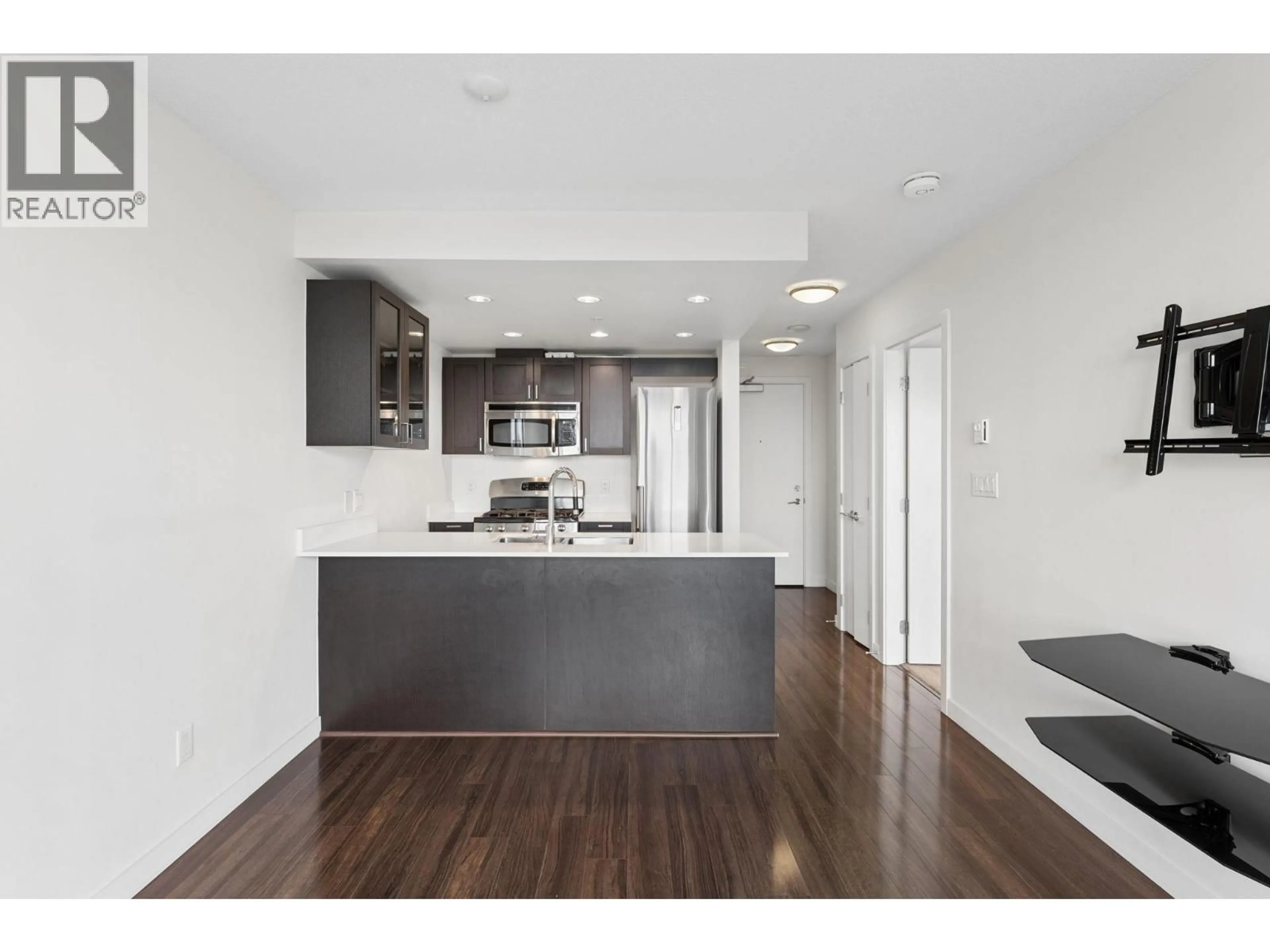 Open concept kitchen, wood/laminate floor for 1003 - 4815 ELDORADO MEWS, Vancouver British Columbia V5R0B2
