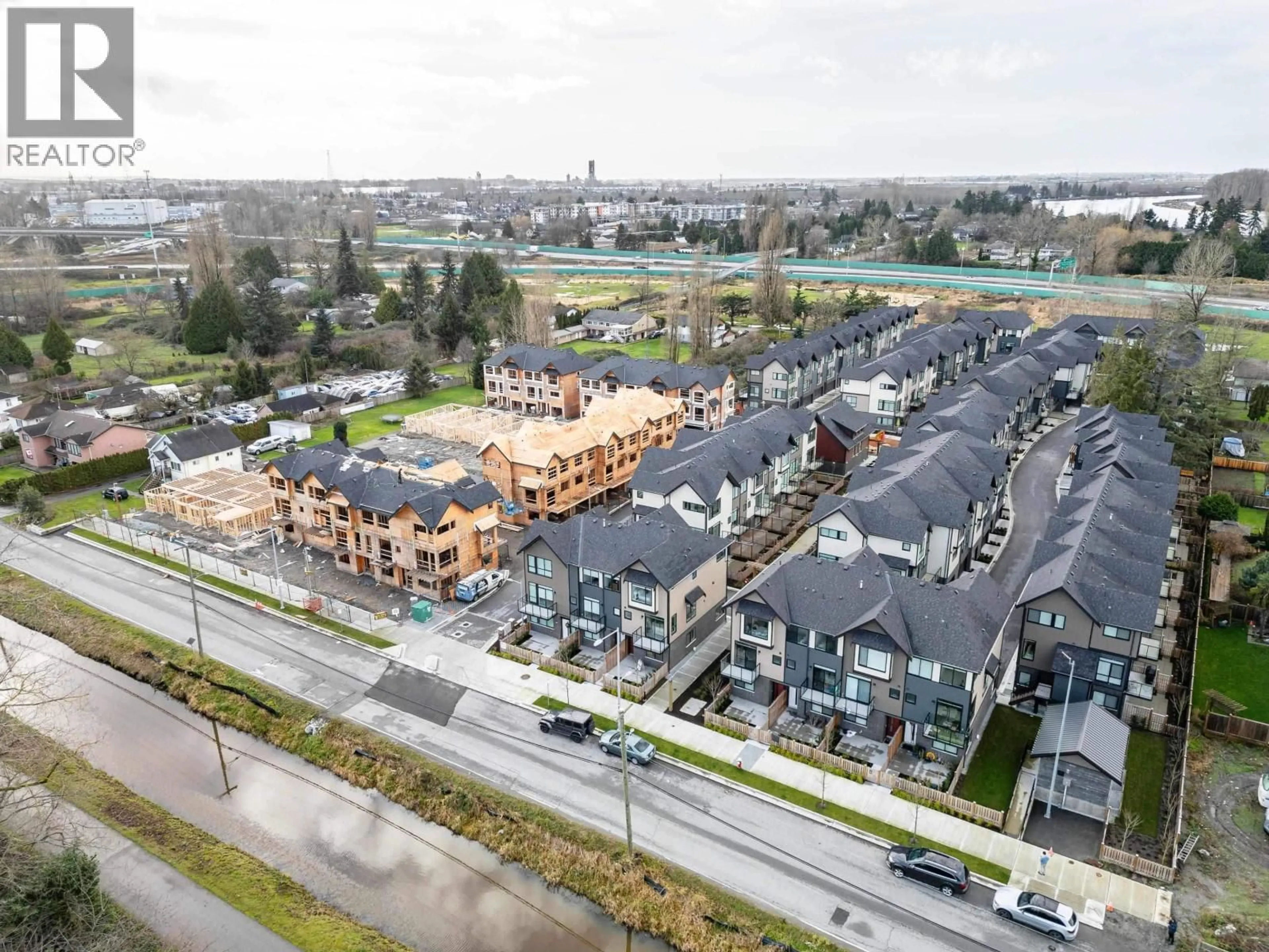 A pic from outside/outdoor area/front of a property/back of a property/a pic from drone, street for 13 - 4337 BOUNDARY ROAD, Richmond British Columbia V6V1S8
