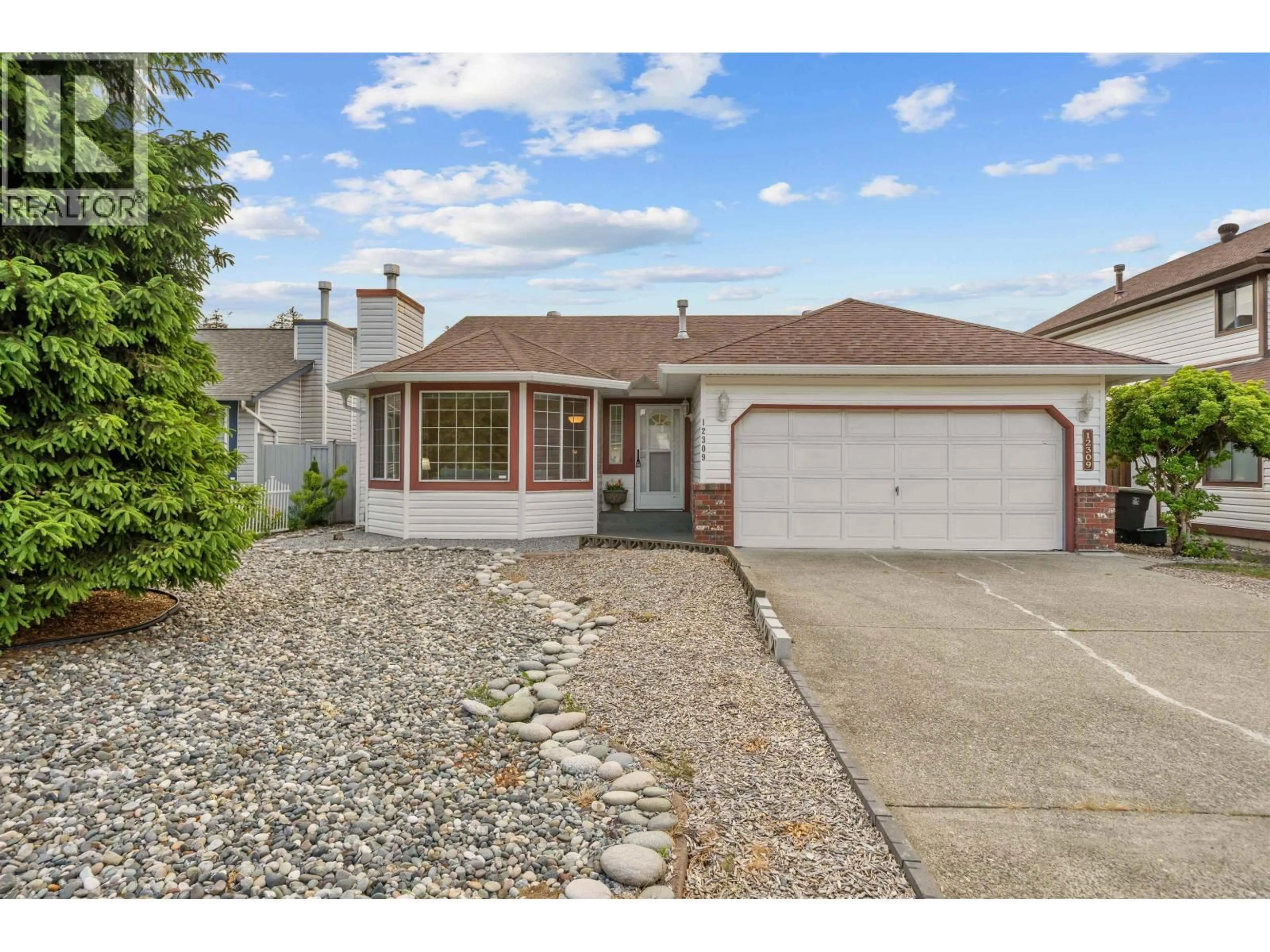 Home with vinyl exterior material, street for 12309 193 STREET, Pitt Meadows British Columbia V3Y2K2