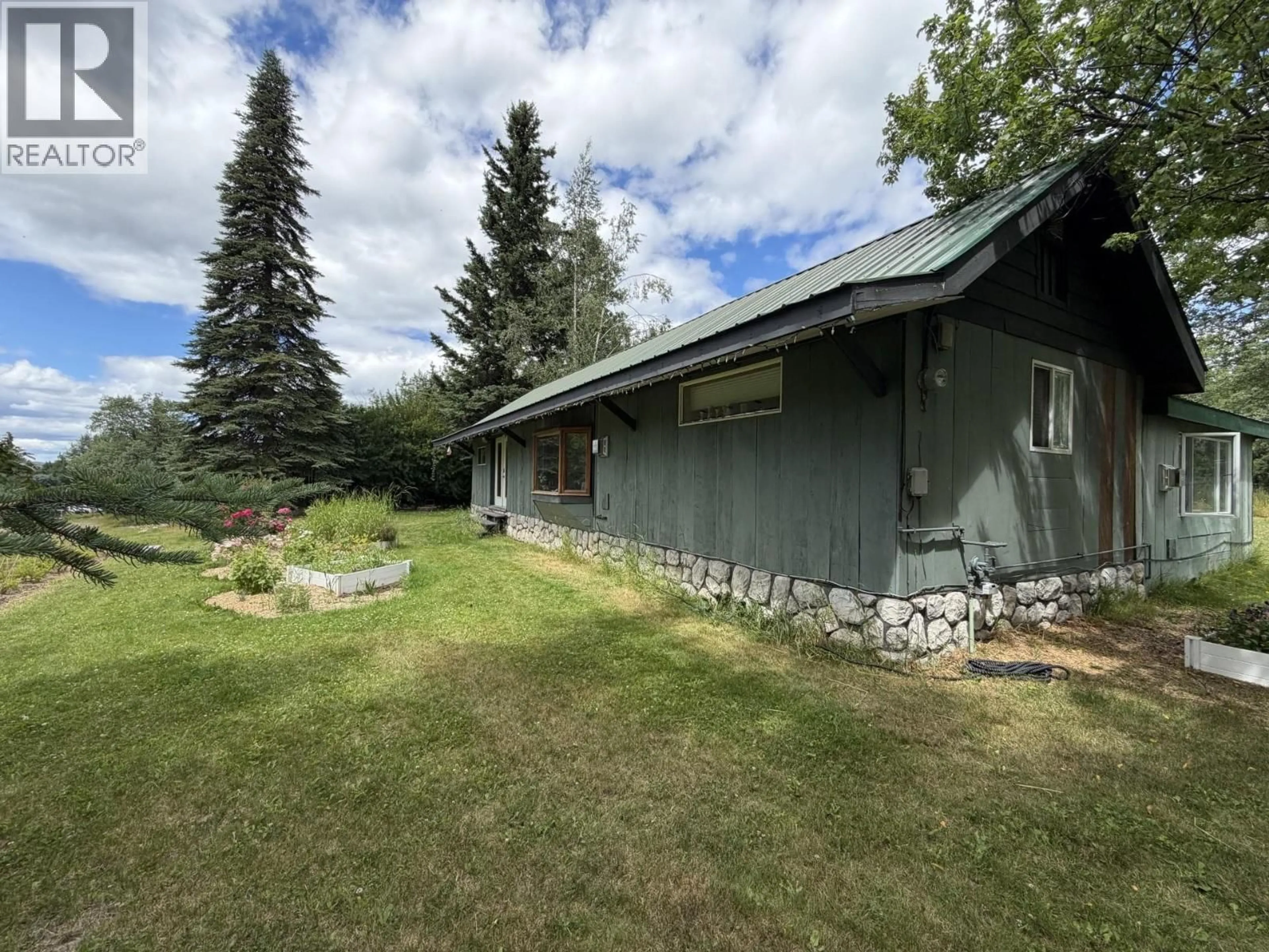 A pic from outside/outdoor area/front of a property/back of a property/a pic from drone, mountain view for 561 6TH AVENUE, Fort Fraser British Columbia V0J1N0