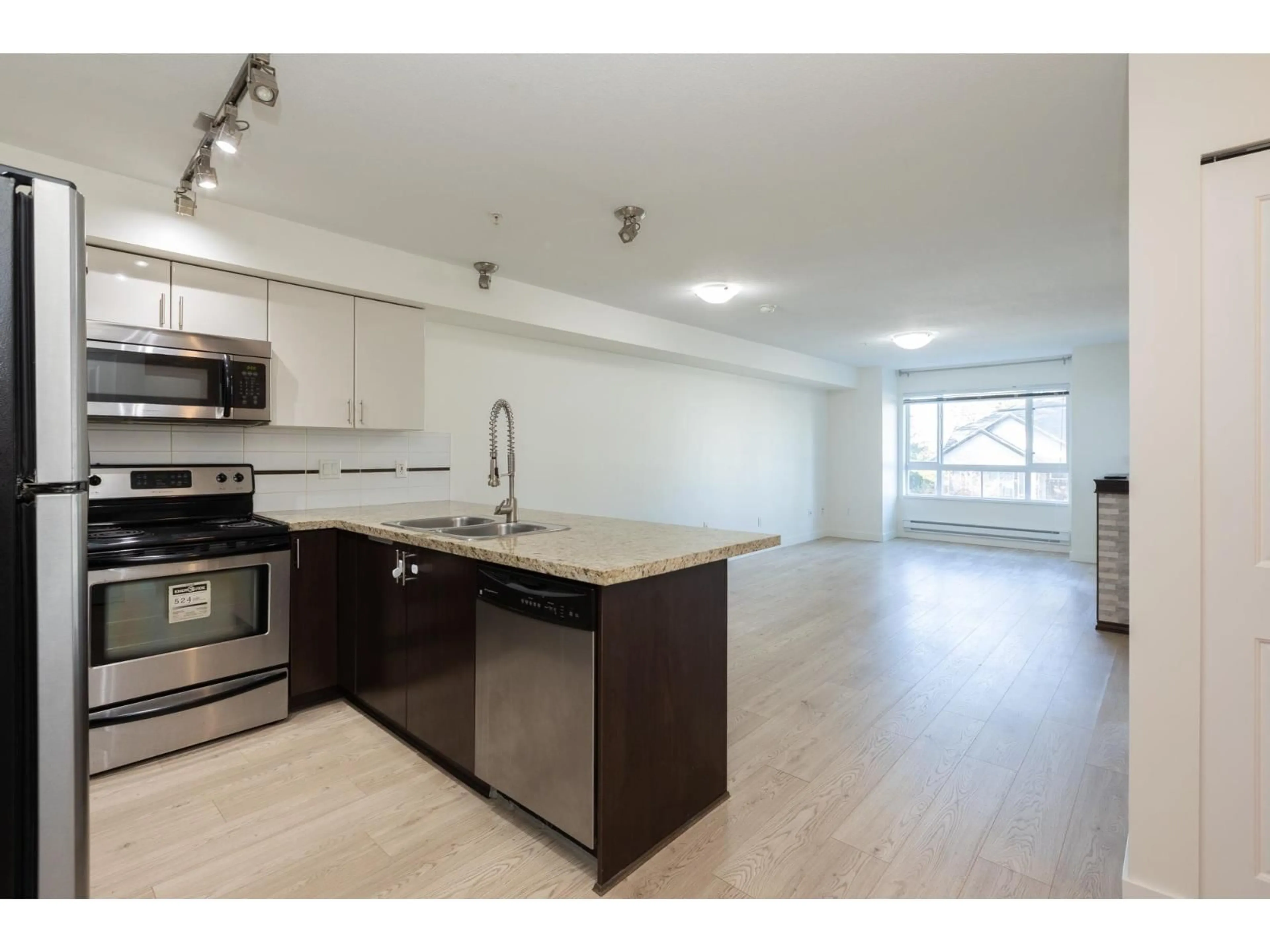 Open concept kitchen, unknown for 202 - 14960 102A AVENUE, Surrey British Columbia V3R6A3