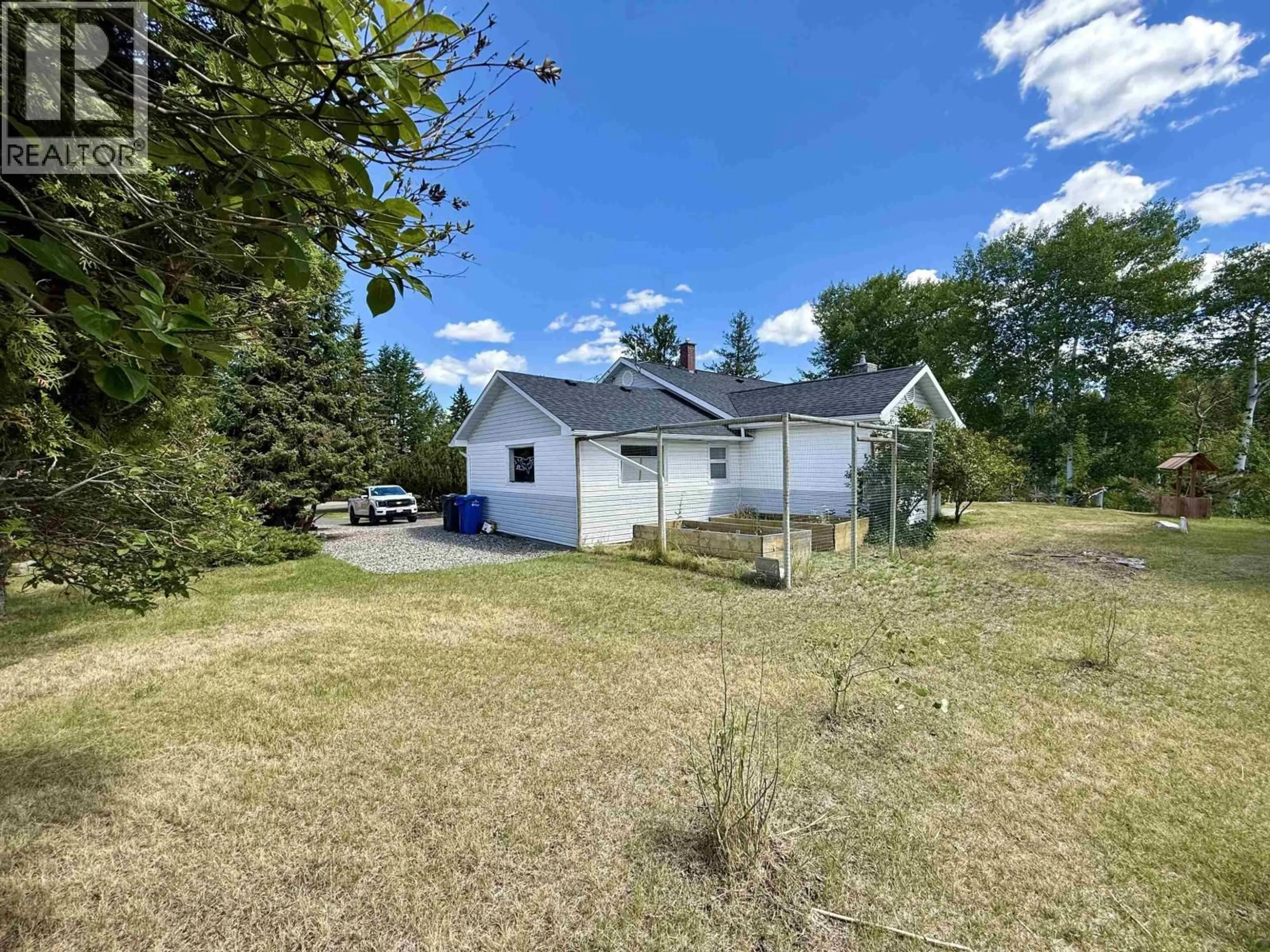 A pic from outside/outdoor area/front of a property/back of a property/a pic from drone, unknown for 185 BRIDGE CREEK PLACE, 100 Mile House British Columbia V0K2E0