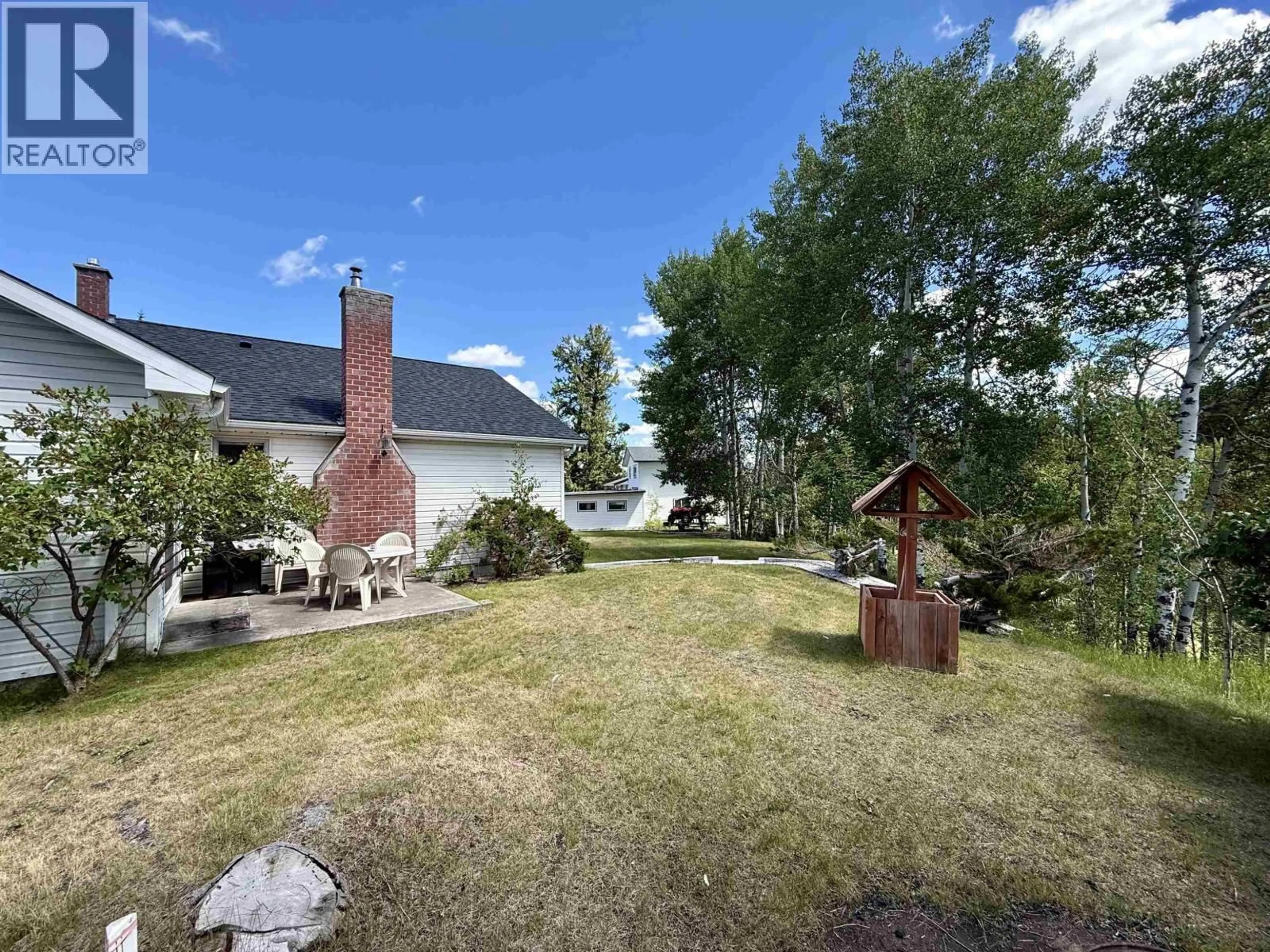 A pic from outside/outdoor area/front of a property/back of a property/a pic from drone, mountain view for 185 BRIDGE CREEK PLACE, 100 Mile House British Columbia V0K2E0