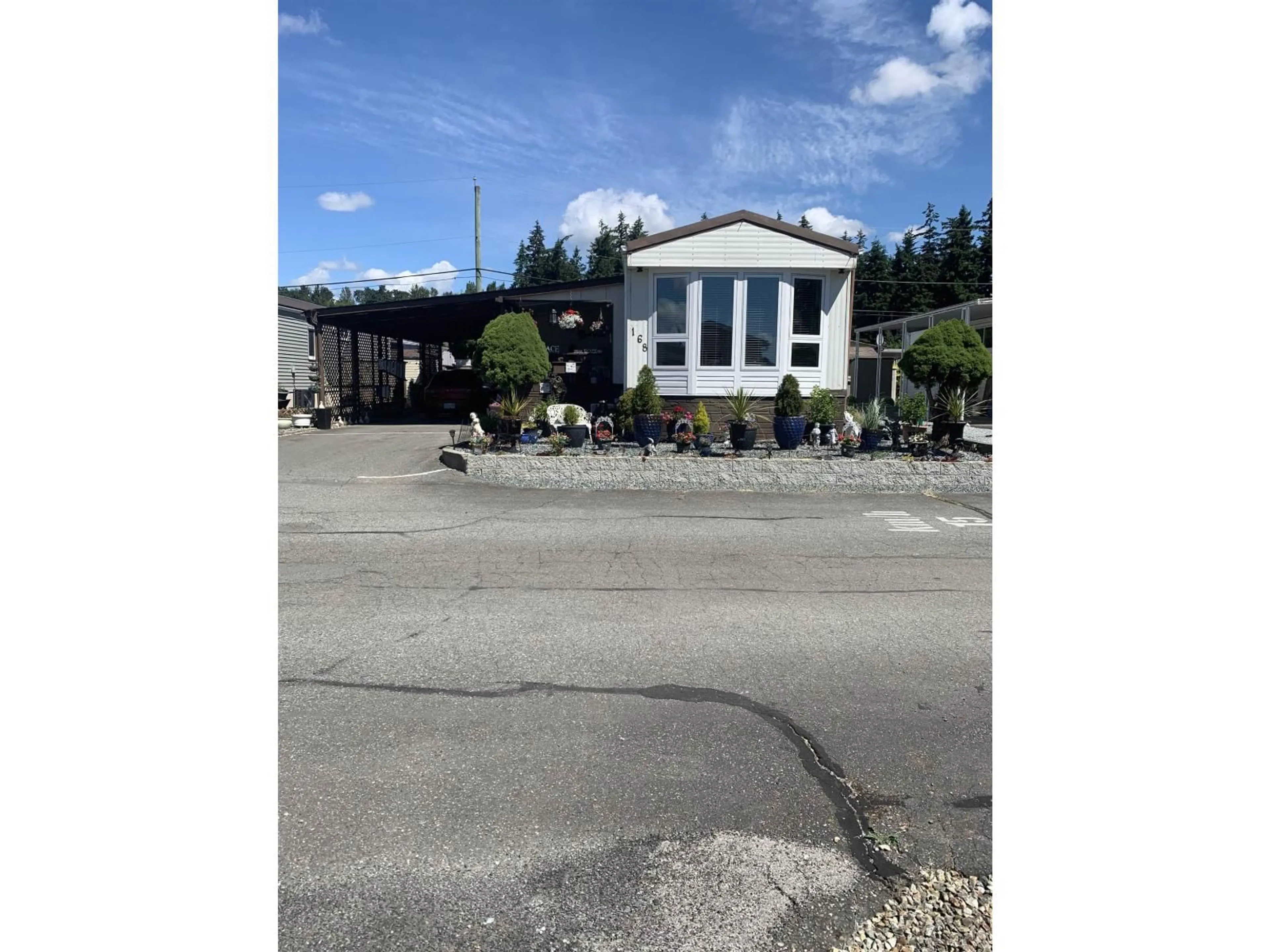 A pic from outside/outdoor area/front of a property/back of a property/a pic from drone, street for 168 - 27111 0 AVENUE, Langley British Columbia V4W2T4