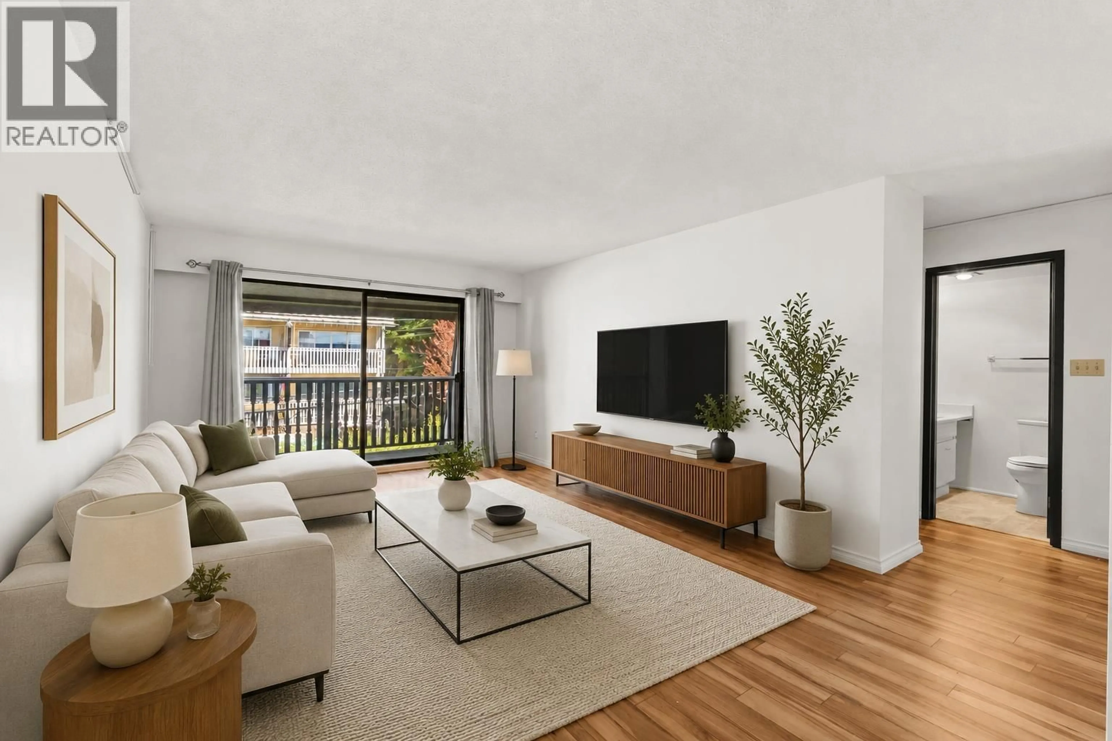 Living room with furniture, wood/laminate floor for 315 - 310 3RD STREET, North Vancouver British Columbia V7M1G4