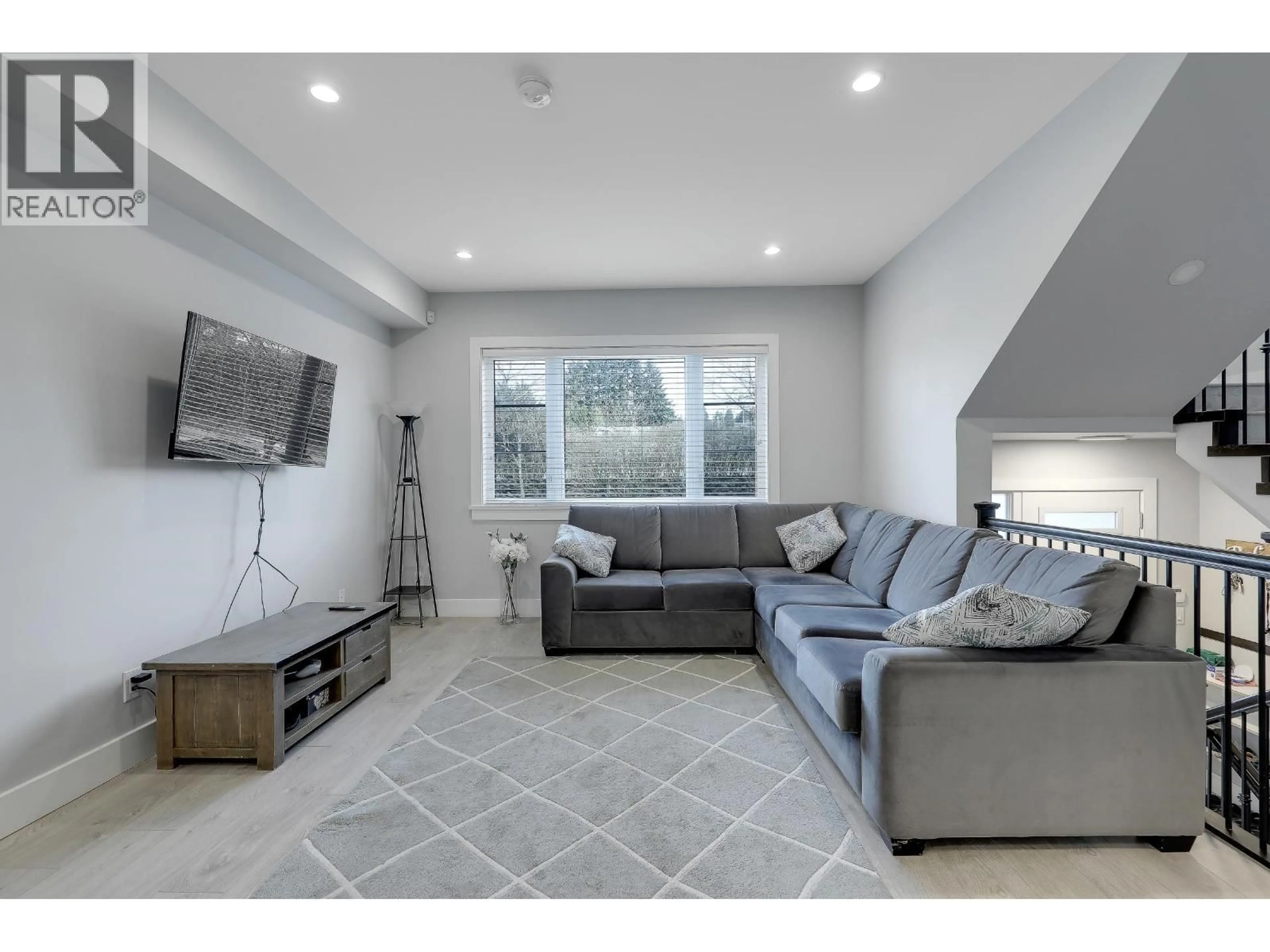 Living room with furniture, ceramic/tile floor for 102 - 806 GAUTHIER AVENUE, Coquitlam British Columbia V3K1R9