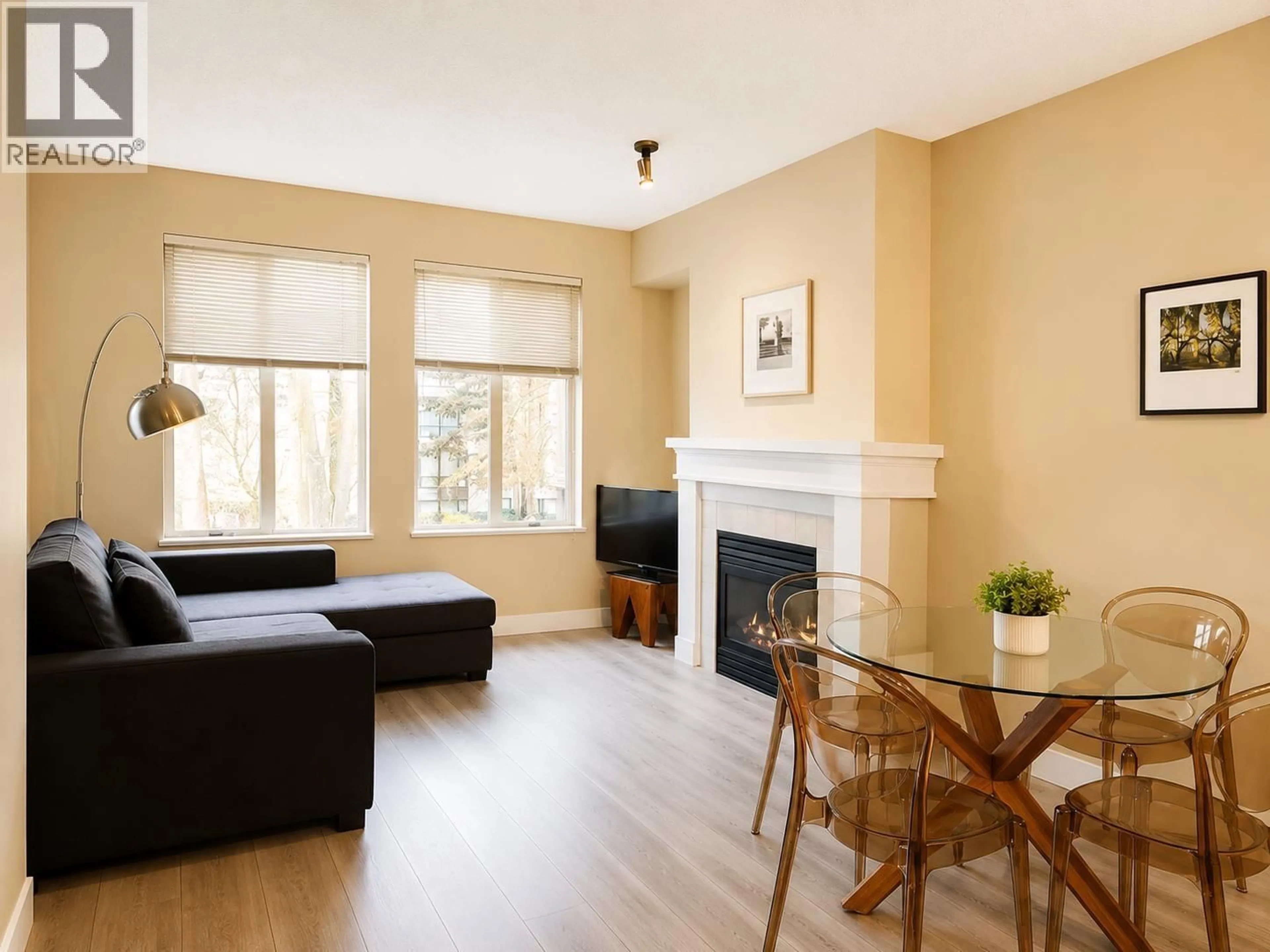 Living room with furniture, wood/laminate floor for 205 - 4885 VALLEY DRIVE, Vancouver British Columbia V6J5M7