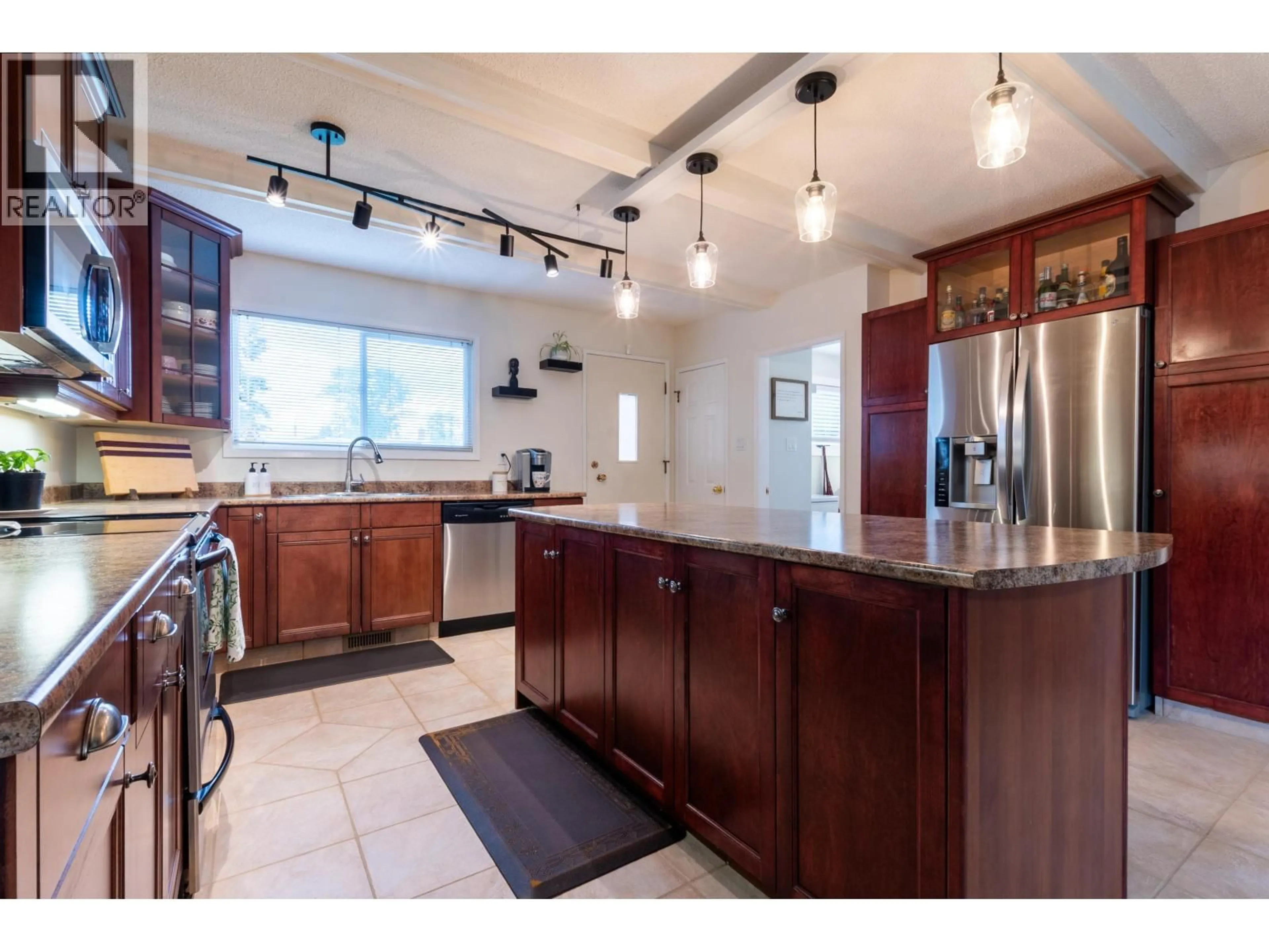 Open concept kitchen, ceramic/tile floor for 1625 GILLETT STREET, Prince George British Columbia V2M2V5