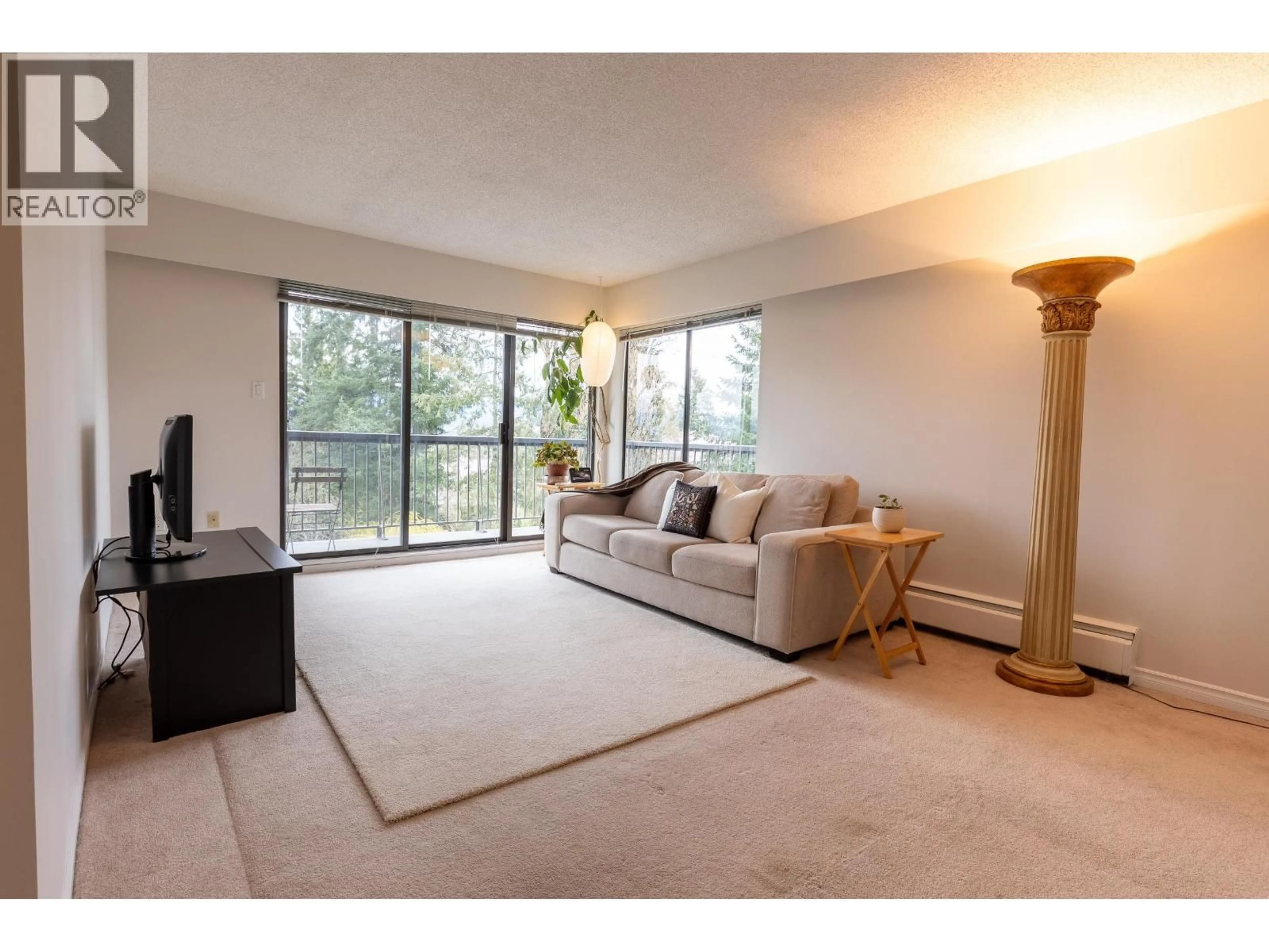 Living room with furniture, unknown for 304 - 4345 GRANGE STREET, Burnaby British Columbia V5H1P4