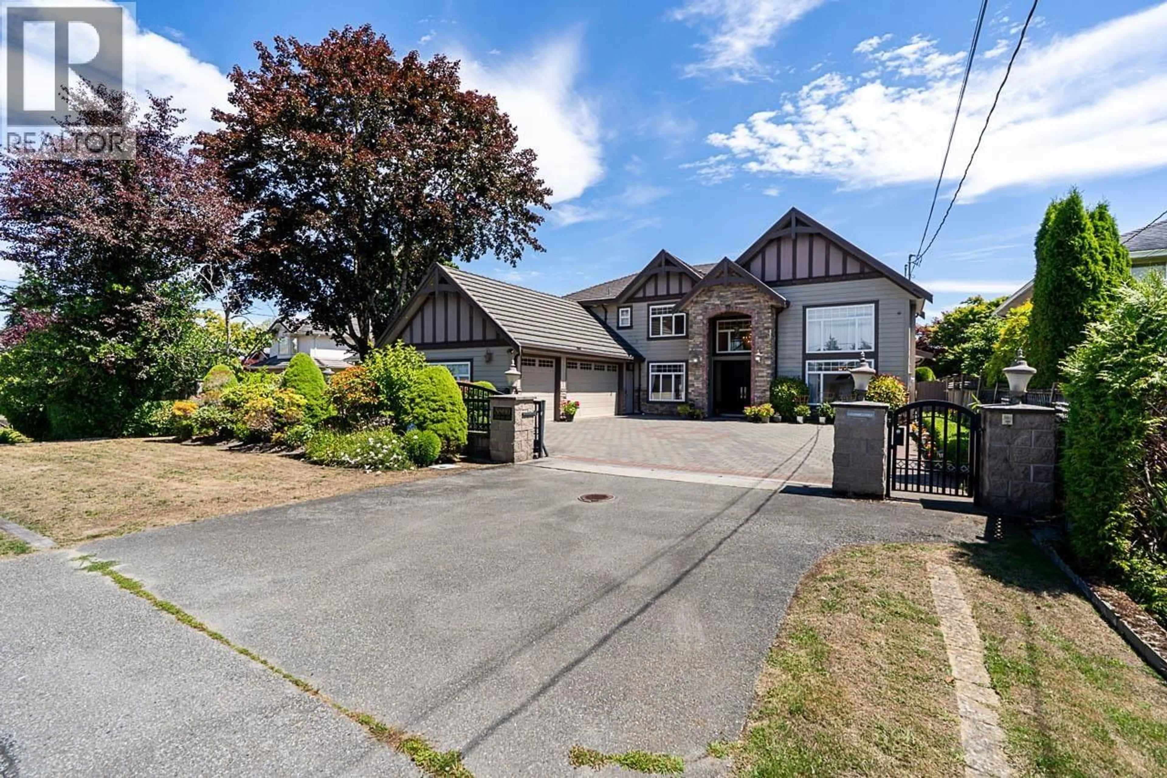 A pic from outside/outdoor area/front of a property/back of a property/a pic from drone, street for 8800 MOORE ROAD, Richmond British Columbia V6Y2J1