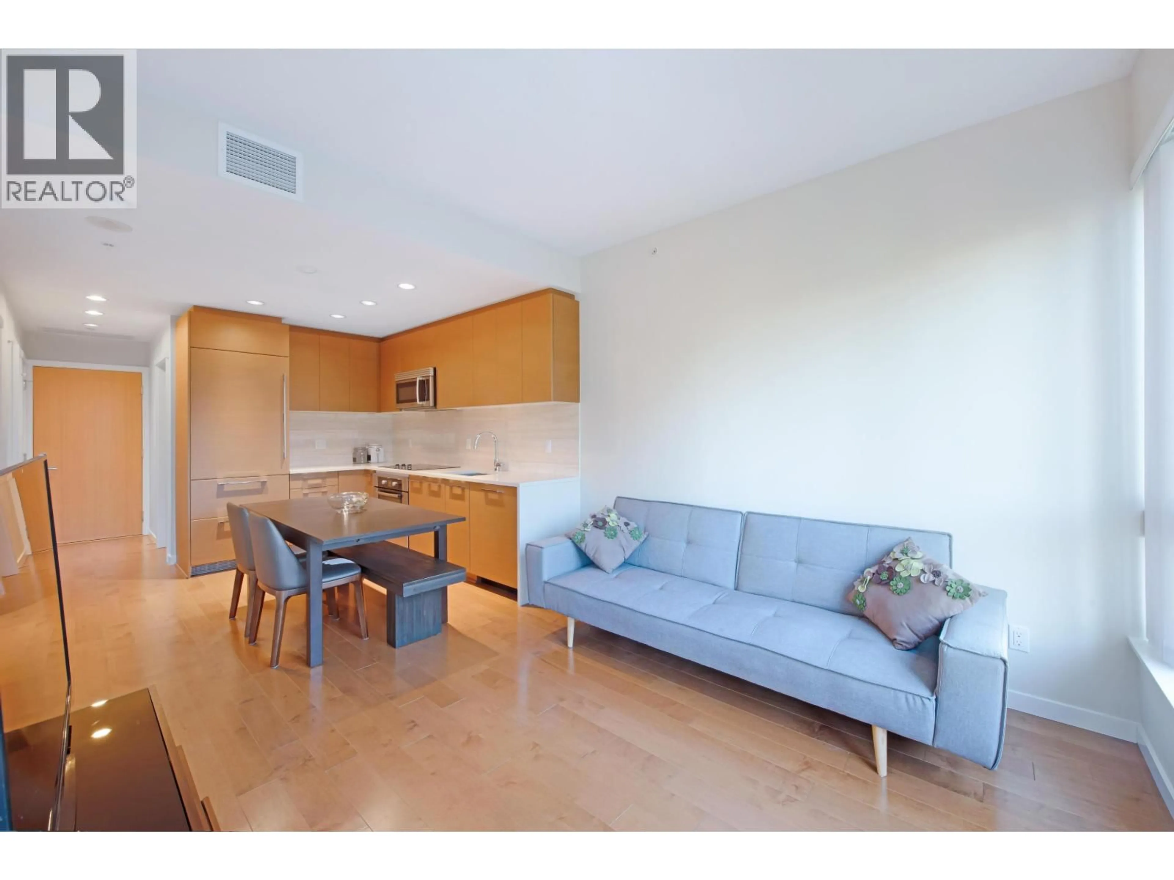 Living room with furniture, wood/laminate floor for 1709 - 5728 BERTON AVENUE, Vancouver British Columbia V6S0E5